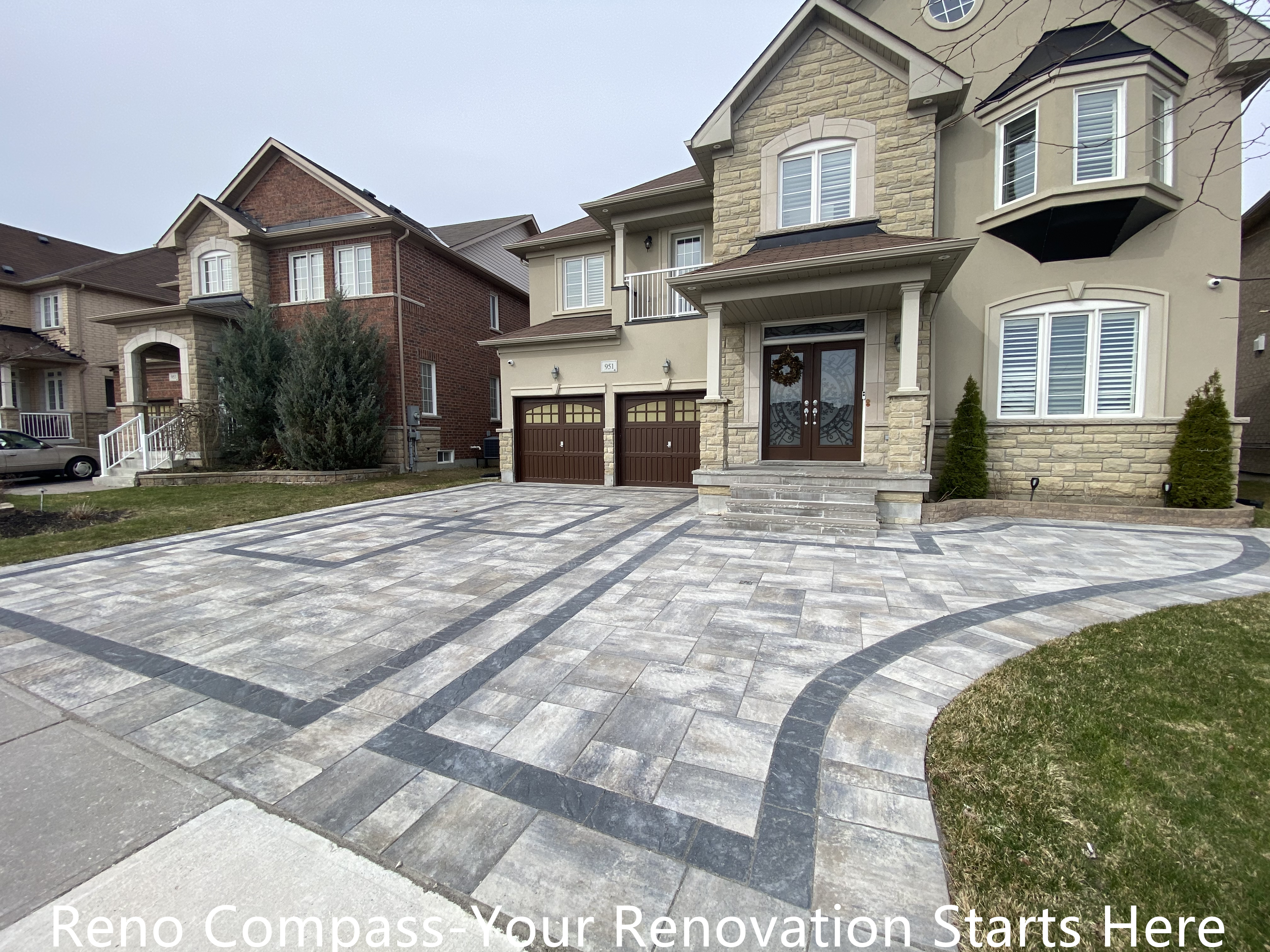Completed interlocking driveway renovation in Newmarket featuring a large-scale front yard hardscape with patterned concrete pavers and contrasting border lines. The upgraded driveway enhances curb appeal, provides a durable parking surface, and complements the home’s exterior architecture. Designed and installed by a trusted Toronto renovation company specializing in high-quality residential exterior renovations.