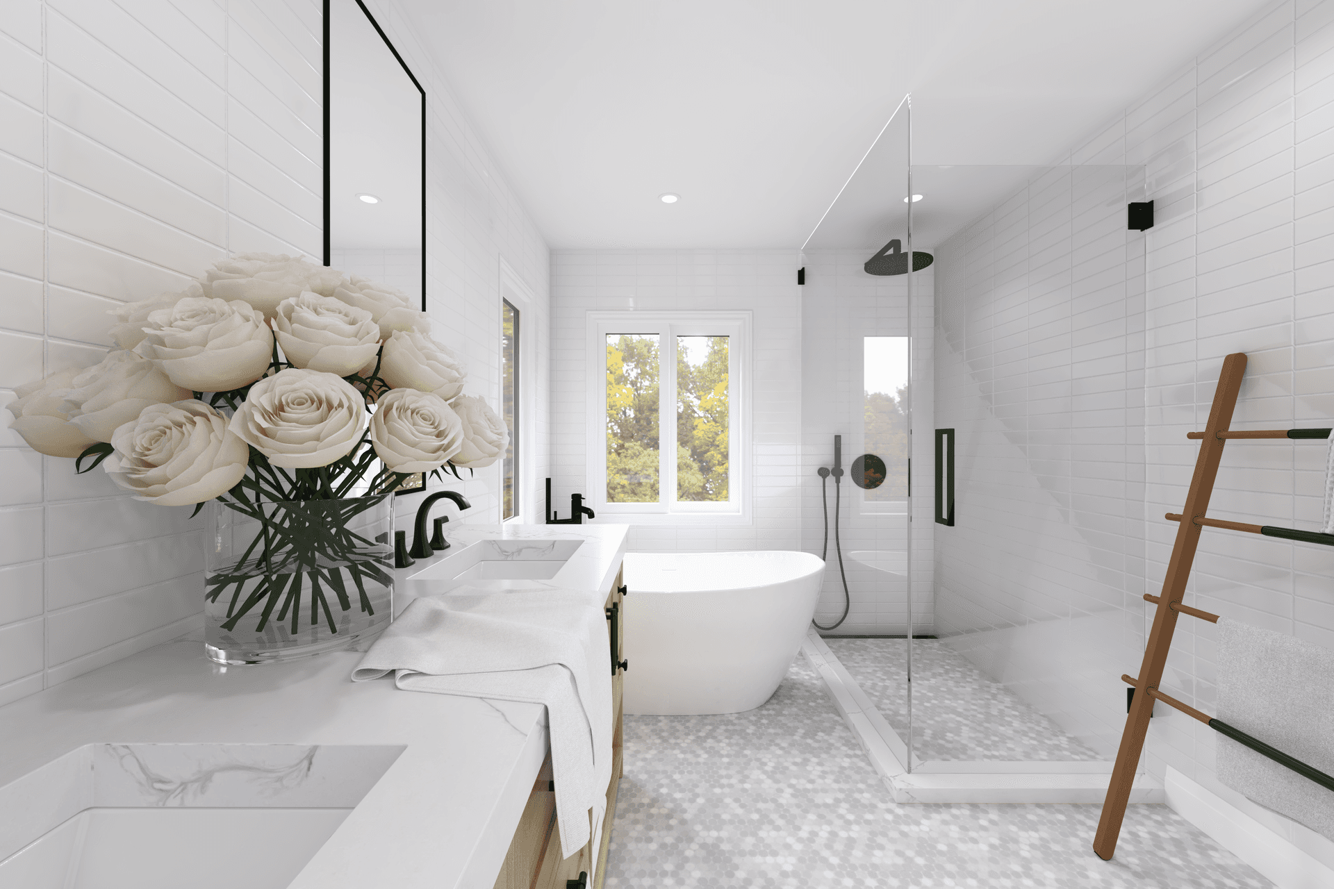 This Oakville interior design bathroom features a clean, light-filled layout with a freestanding bathtub, frameless glass shower, and custom vanity. White wall tiles and soft-toned flooring enhance brightness, while matte black fixtures add subtle contrast. The space is designed to feel open, calm, and comfortable, with a strong focus on everyday functionality and visual balance.