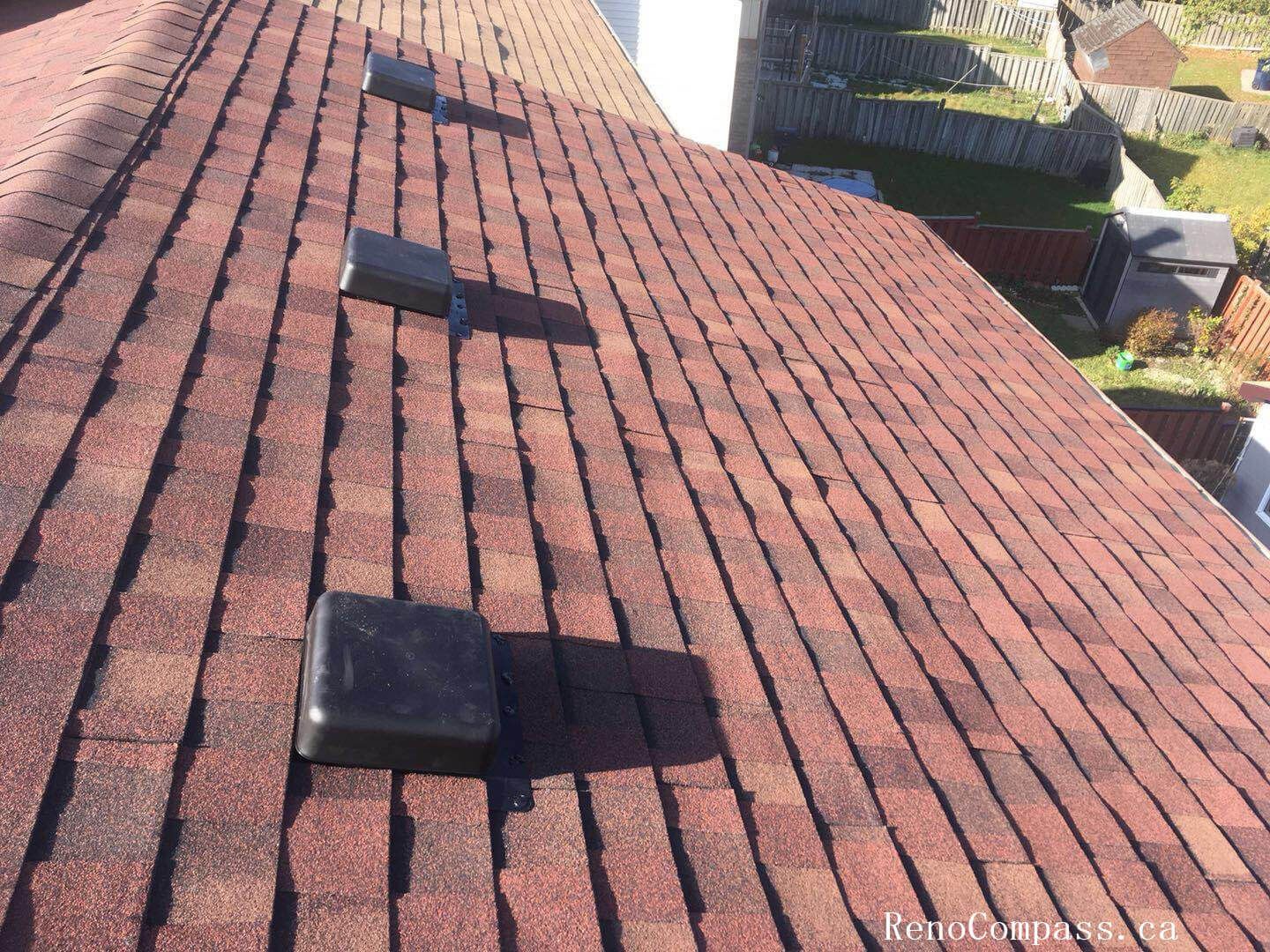 This image highlights a completed roofing replacement project in Toronto, featuring newly installed asphalt shingles designed for durability and long-term weather protection. The roofing system includes properly aligned shingle installation and upgraded roof ventilation units to improve airflow and prevent moisture buildup. Careful attention was given to roof slope consistency, flashing details, and overall finishing to ensure reliable performance through Toronto’s harsh winters and seasonal changes. Completed by an experienced Toronto roofing and renovation team, the project enhances both structural protection and the home’s exterior appearance while maintaining high installation standards.