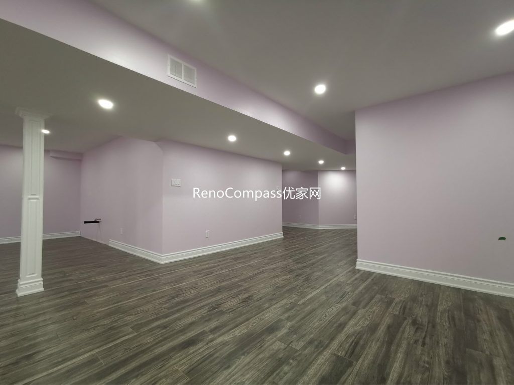 This Richmond Hill basement renovation features a spacious open-concept layout with modern recessed lighting, durable wood-look flooring, and soft neutral wall tones to create a bright and welcoming environment. Completed by a professional Toronto renovation company, the redesigned basement offers a versatile living area suitable for entertainment, rental potential, or extended family use. The clean layout and upgraded finishes enhance both functionality and overall property value.