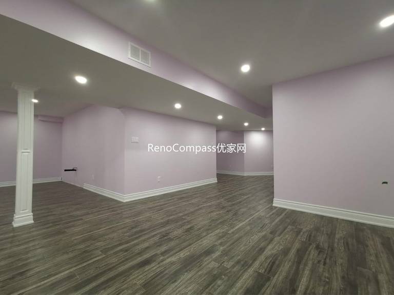 This Richmond Hill basement renovation features a spacious open-concept layout with modern recessed lighting, durable wood-look flooring, and soft neutral wall tones to create a bright and welcoming environment. Completed by a professional Toronto renovation company, the redesigned basement offers a versatile living area suitable for entertainment, rental potential, or extended family use. The clean layout and upgraded finishes enhance both functionality and overall property value.