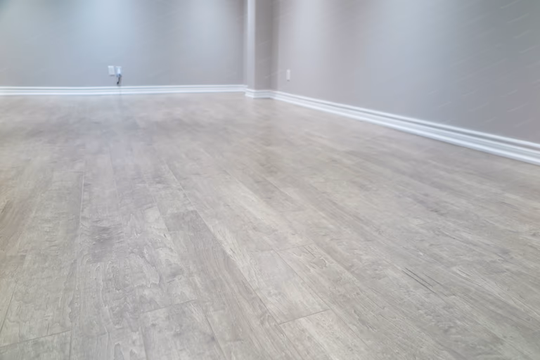 A clean and modern basement renovation in Richmond Hill featuring a well-organized layout, neutral finishes, and improved functionality for everyday use.