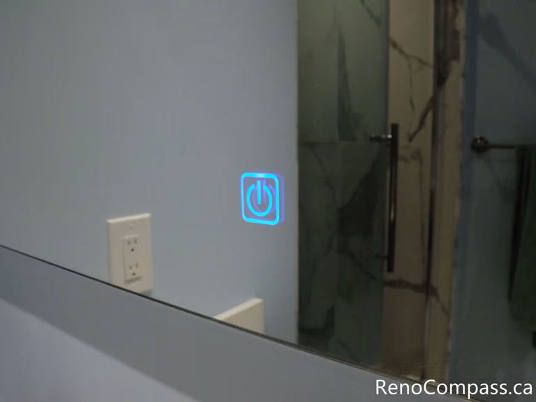 This modern bathroom upgrade in Richmond Hill includes a sleek vanity, updated mirror, and improved lighting layout to enhance functionality and style. Completed by a trusted Toronto renovation company, the new design creates a brighter, more efficient space with a clean contemporary finish.