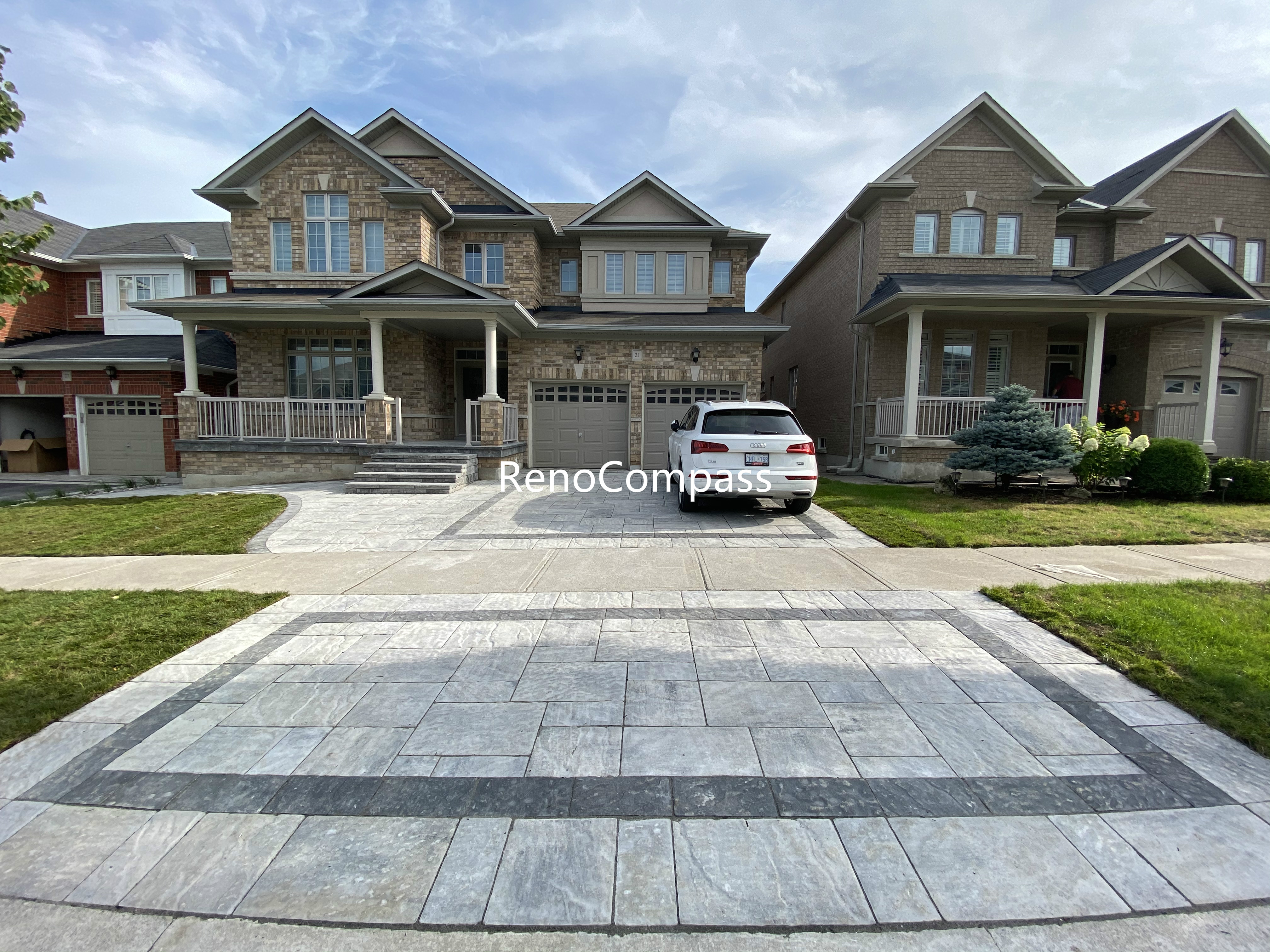 This Aurora front and backyard interlocking project features a modern driveway design using large-format concrete pavers with a contrasting border layout. The clean geometric pattern enhances curb appeal while ensuring long-term durability and proper drainage. The interlock driveway seamlessly connects the front entrance and backyard space, creating a cohesive and functional outdoor layout. Designed for both aesthetics and daily use, this project reflects professional craftsmanship and attention to detail, making it an ideal solution for homeowners seeking a modern outdoor upgrade in Aurora.
