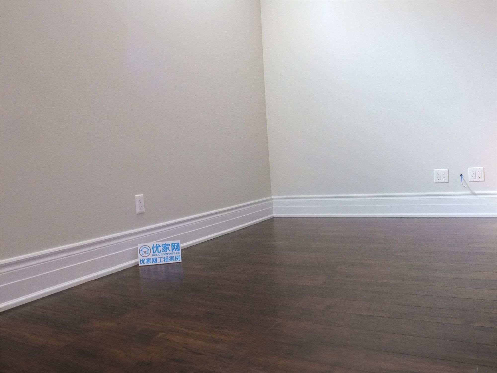 This Richmond Hill basement renovation features a finished bedroom with built-in closet storage, smooth wall finishes, and dark hardwood flooring. The space is designed for comfort and functionality, making it ideal for a guest room, home office, or rental basement unit.