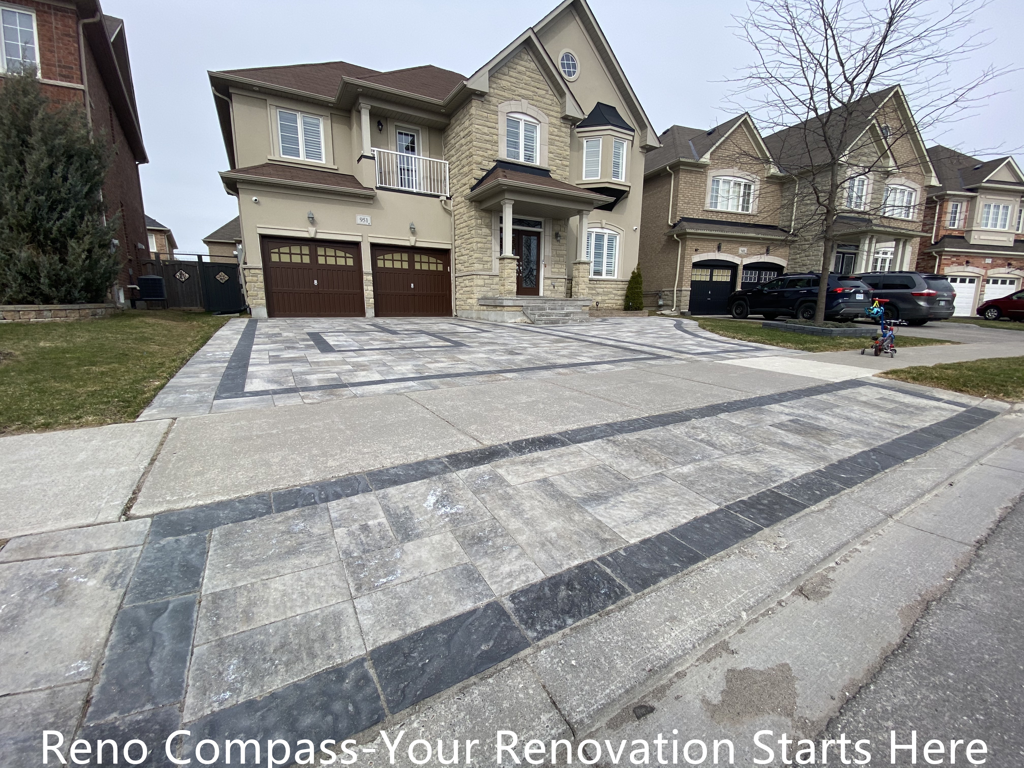 Completed interlocking driveway renovation in Newmarket featuring a large-scale front yard hardscape with patterned concrete pavers and contrasting border lines. The upgraded driveway enhances curb appeal, provides a durable parking surface, and complements the home’s exterior architecture. Designed and installed by a trusted Toronto renovation company specializing in high-quality residential exterior renovations.