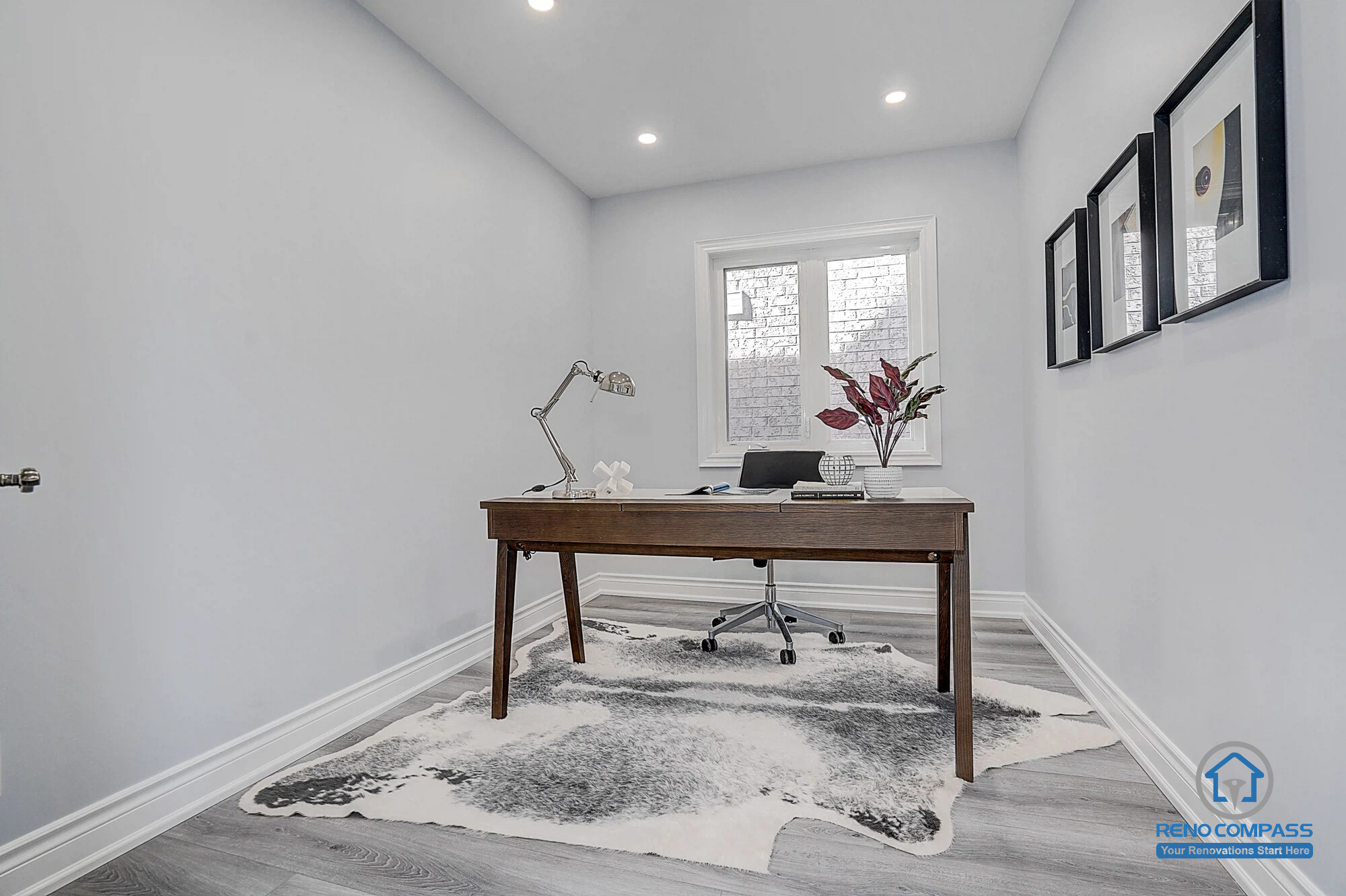 Home office renovation in Vaughan featuring new flooring, pot lights installation, and clean wall painting for a bright and functional workspace.