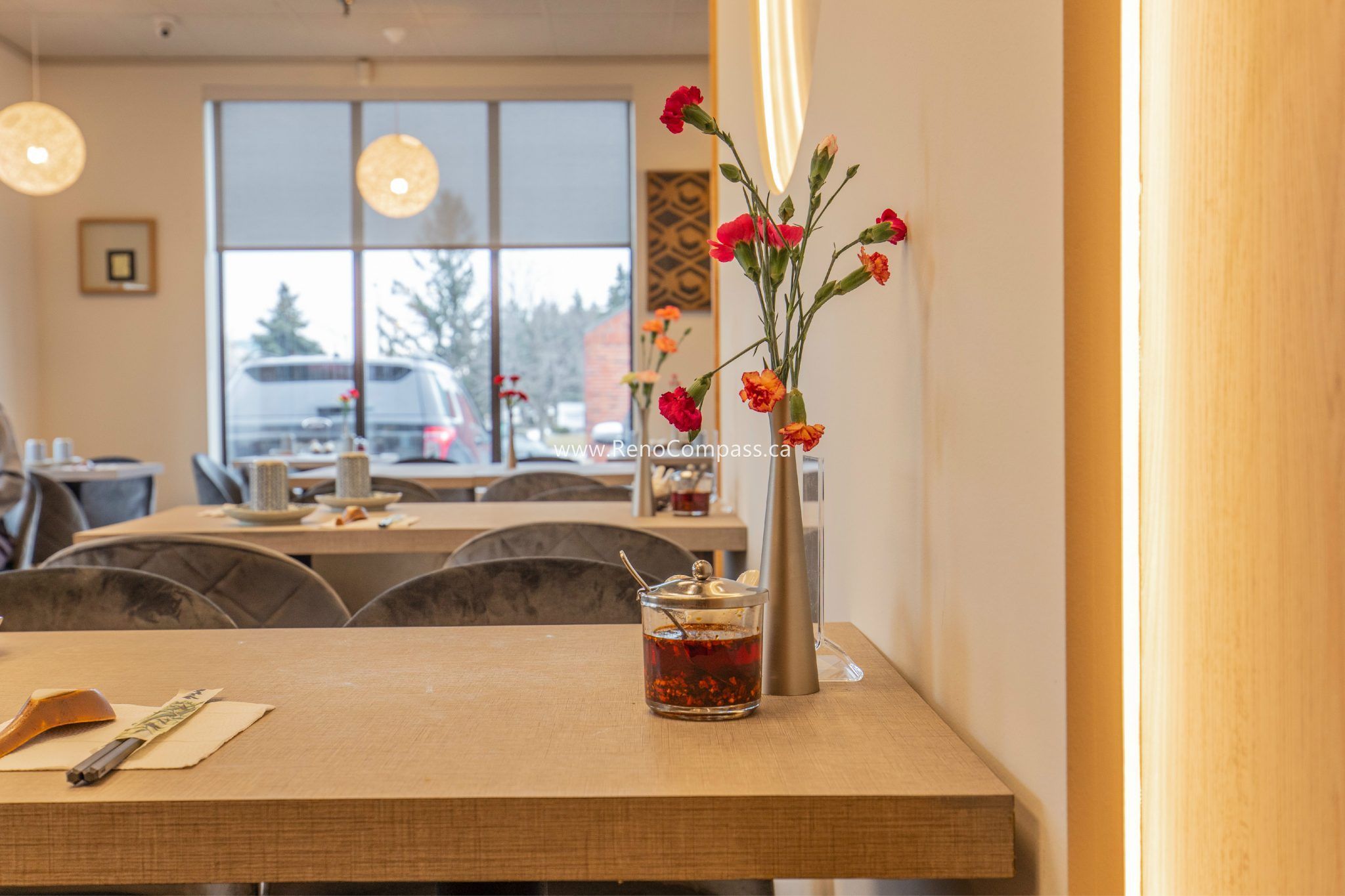 This Richmond Hill Chinese restaurant renovation by Toronto renovation company Reno Compass Inc. highlights refined dining table details and a warm, modern interior atmosphere. The upgraded space features custom dining tables, soft ambient lighting, elegant floral décor, and contemporary seating that enhance the overall customer experience. Designed to balance aesthetics and functionality, the renovation creates a welcoming and comfortable environment that elevates the restaurant’s brand image while supporting efficient daily operations.