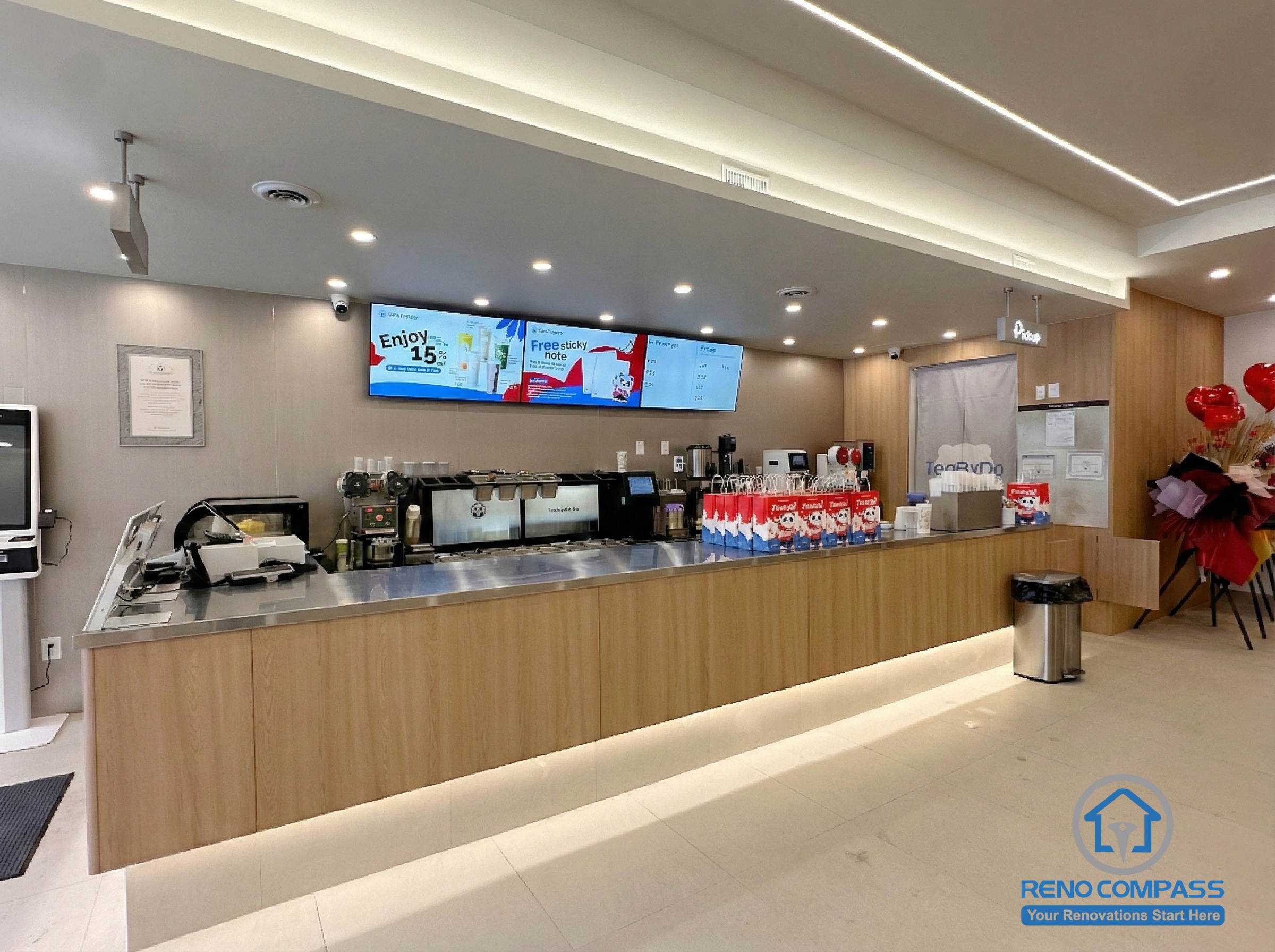 This North York bubble tea shop renovation features a modern service counter, digital menu display, and efficient ordering layout designed for high customer traffic. Completed by a professional Toronto renovation company, the commercial interior combines clean finishes, warm lighting, and functional workflow to enhance both customer experience and daily store operations.