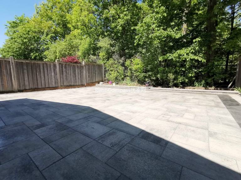 Close-up view of premium interlocking stone installation in Mississauga backyard, showcasing precise stone alignment, high-quality materials, and professional landscaping craftsmanship.