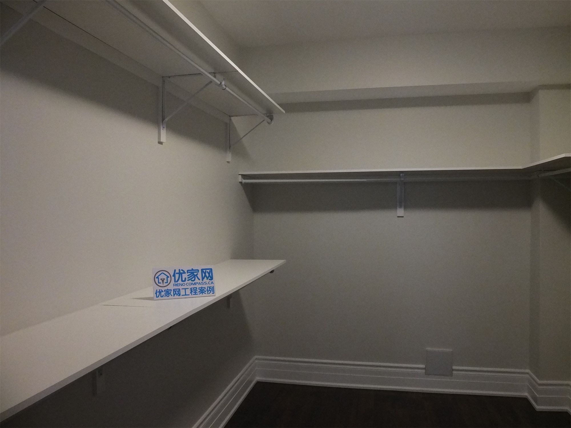 This Richmond Hill basement renovation includes a functional walk-in closet designed with custom shelving and hanging rods for efficient storage. The clean layout maximizes space utilization, making it ideal for organizing clothing, seasonal items, or additional household storage in the basement.