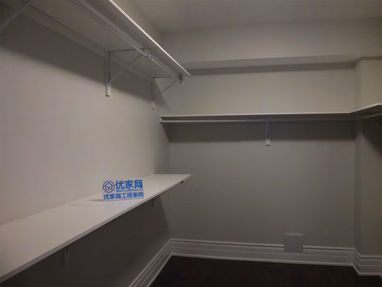 This Richmond Hill basement renovation includes a functional walk-in closet designed with custom shelving and hanging rods for efficient storage. The clean layout maximizes space utilization, making it ideal for organizing clothing, seasonal items, or additional household storage in the basement.