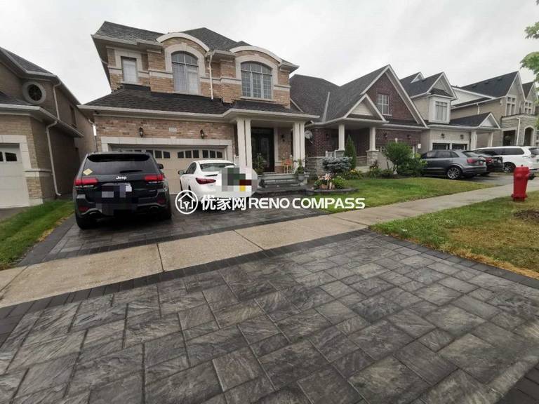 Complete front yard transformation in Aurora featuring a custom interlocking stone driveway, elegant walkway, and professional landscaping. Designed and built by Reno Compass, this project highlights superior craftsmanship and Toronto-level renovation quality.