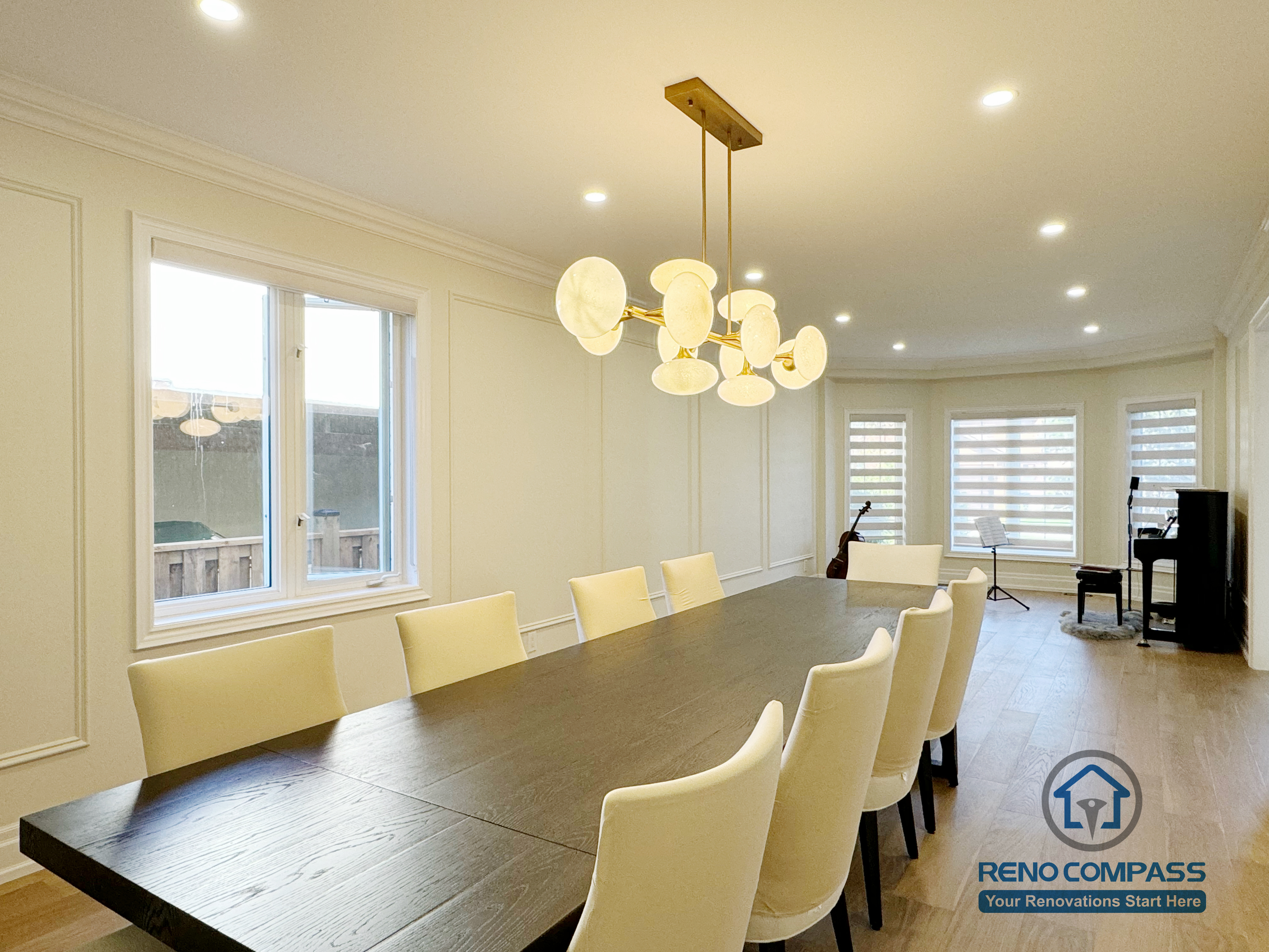 This image highlights a completed flooring renovation in North York, featuring hardwood flooring installed throughout a formal dining area. The natural wood finish adds warmth and continuity to the space while complementing the clean wall paneling and recessed lighting. The flooring installation enhances durability and everyday usability, providing a smooth visual transition between dining and adjacent living areas. This project reflects a careful approach to hardwood flooring selection and installation for North York homes.