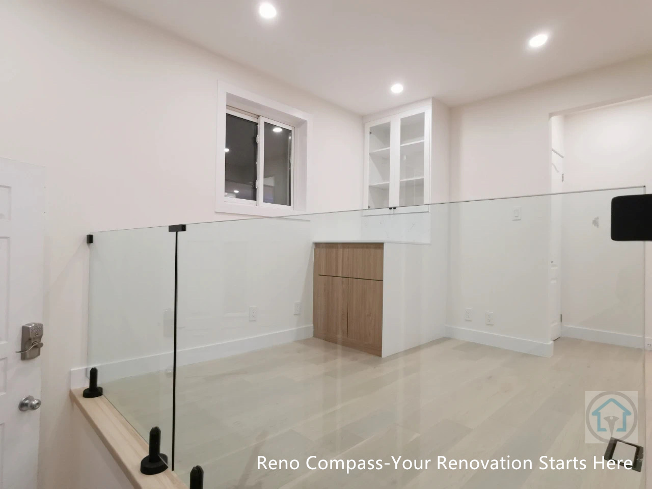 Bright and functional bedroom renovation featuring custom built-in wardrobes, clean white cabinetry, recessed lighting, and light wood flooring. Designed to improve storage efficiency and create a calm, modern living space as part of a full Newmarket interior renovation by Reno Compass Inc.