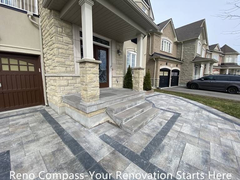 Completed interlocking driveway renovation in Newmarket featuring a large-scale front yard hardscape with patterned concrete pavers and contrasting border lines. The upgraded driveway enhances curb appeal, provides a durable parking surface, and complements the home’s exterior architecture. Designed and installed by a trusted Toronto renovation company specializing in high-quality residential exterior renovations.