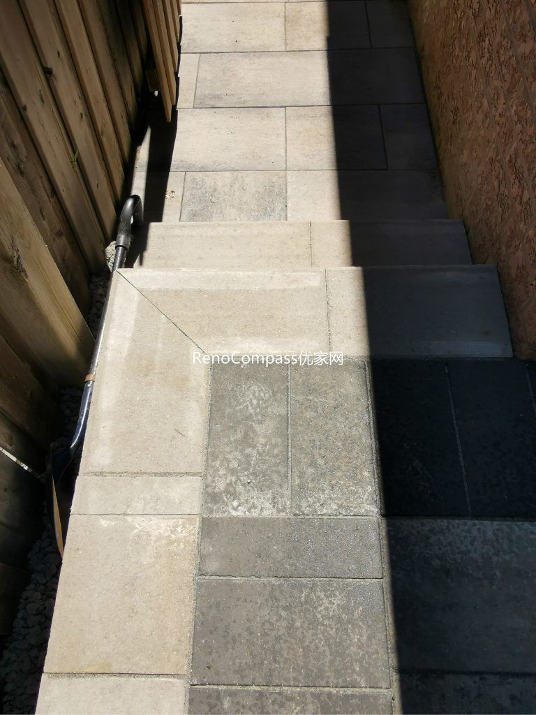 Custom backyard and side yard interlocking installation in Mississauga featuring durable stone pavers and clean modern borders. This professionally installed walkway improves drainage, accessibility, and outdoor usability while creating a neat and low-maintenance pathway between front and backyard spaces.
