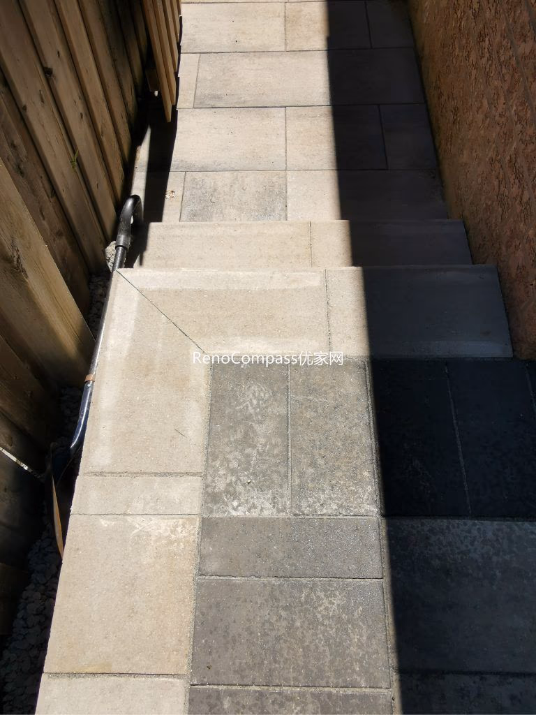Custom backyard and side yard interlocking installation in Mississauga featuring durable stone pavers and clean modern borders. This professionally installed walkway improves drainage, accessibility, and outdoor usability while creating a neat and low-maintenance pathway between front and backyard spaces.