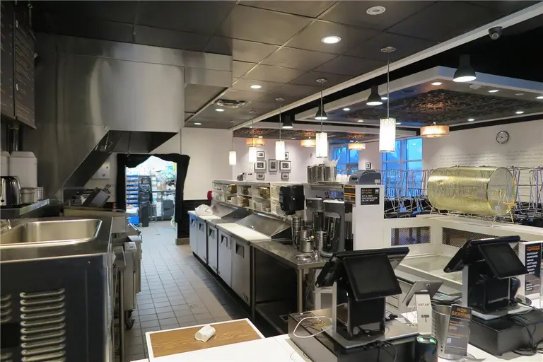 This Toronto restaurant renovation project showcases a fully upgraded commercial kitchen and front service counter area completed by Reno Compass Inc. The scope of work included stainless steel prep stations, commercial-grade ventilation hood installation, new ceiling lighting, POS counter setup, and optimized kitchen workflow layout.

The redesigned space improves operational efficiency, hygiene standards, and customer service flow. Durable flooring, modern pendant lighting, and professional-grade equipment installation ensure the restaurant meets commercial safety codes while maintaining a clean and contemporary appearance.

As a trusted Toronto renovation company, Reno Compass Inc. delivers practical and code-compliant restaurant renovation solutions tailored for food service businesses across the GTA.
