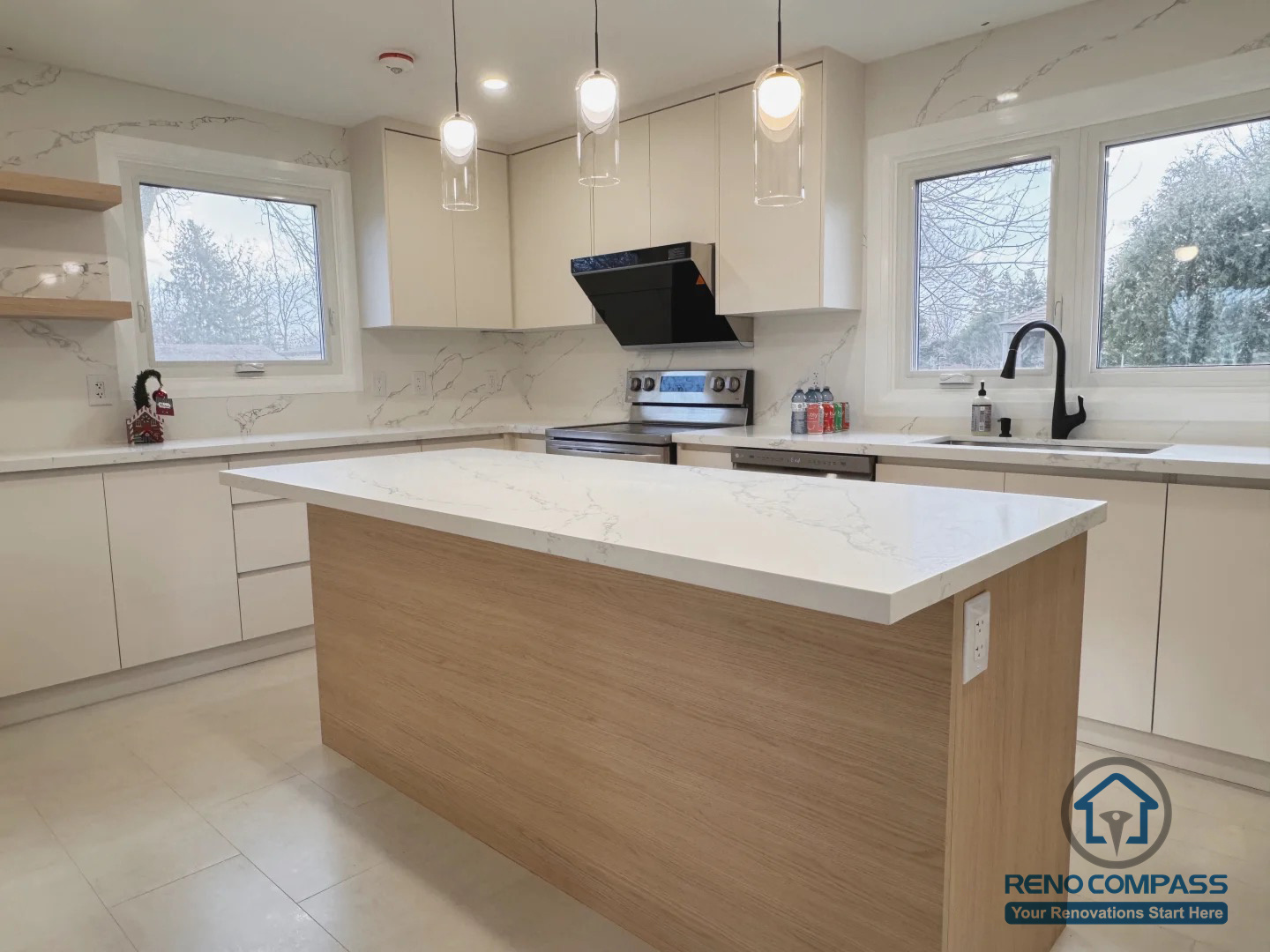This Oakville kitchen renovation features a clean, modern layout with a custom wood-accent island, quartz countertops, and full-height cabinetry. Thoughtful lighting design and a balanced mix of warm wood and neutral finishes create a functional yet inviting space, tailored for everyday living and entertaining.