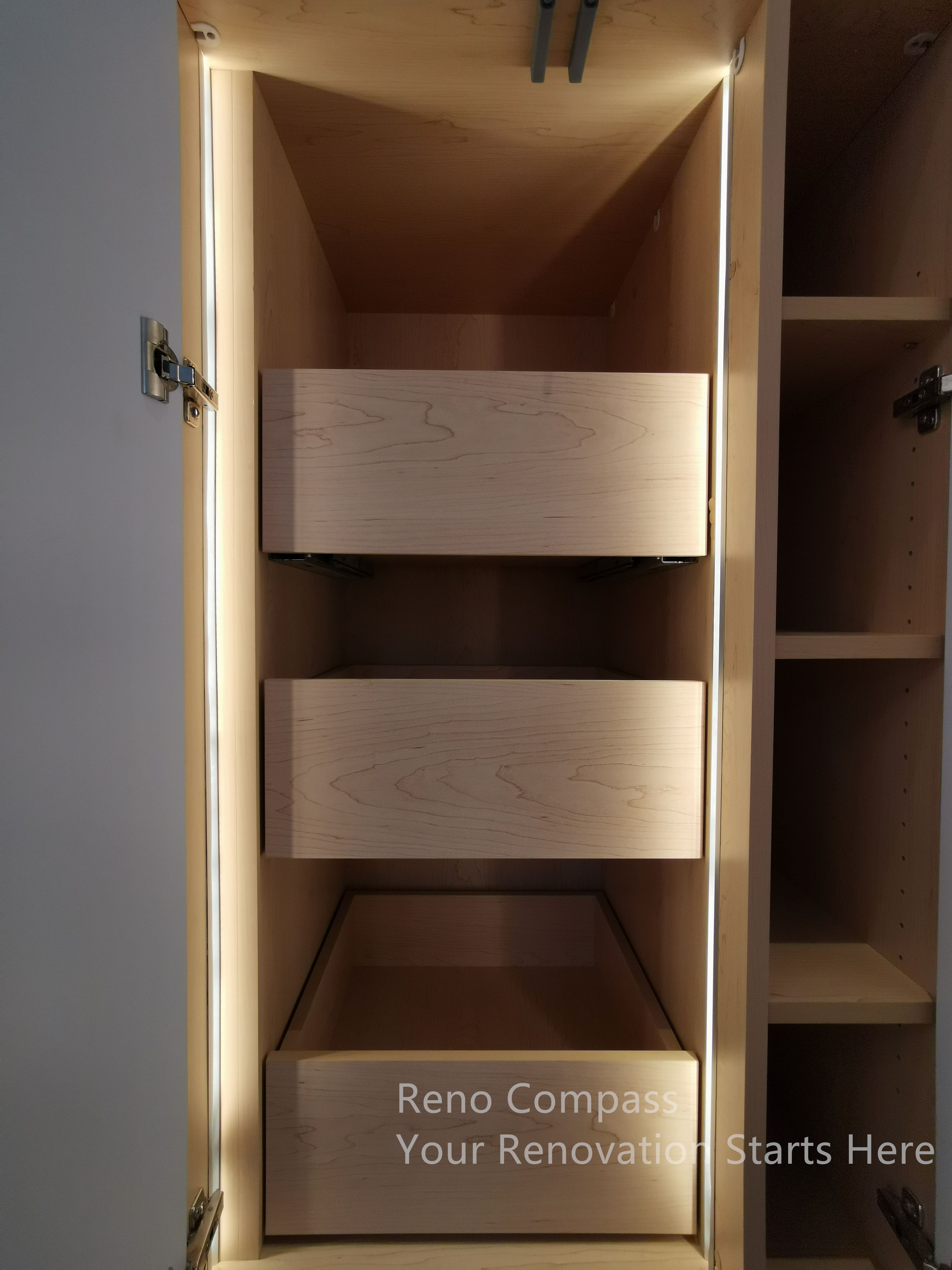 This image highlights the custom cabinetry detail completed as part of the Markham interior renovation. The interior features solid wood drawers with integrated LED lighting, enhancing visibility and everyday functionality. Clean joinery and concealed hardware reflect a focus on craftsmanship, durability, and practical storage solutions within a modern interior design framework.