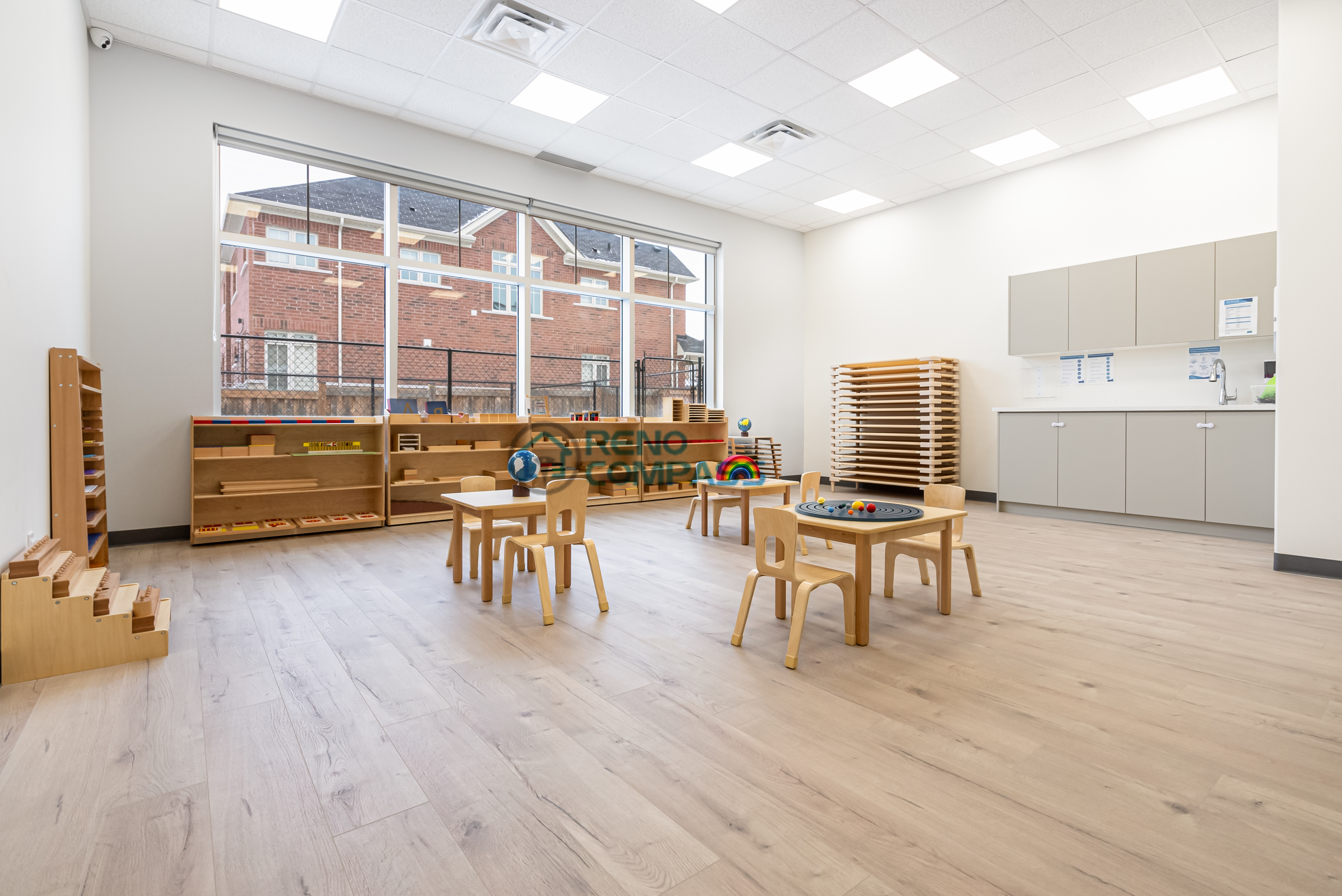 Multi-purpose daycare learning room renovation in Richmond Hill, offering a spacious layout, smooth flooring, and practical finishes suitable for various childcare activities.