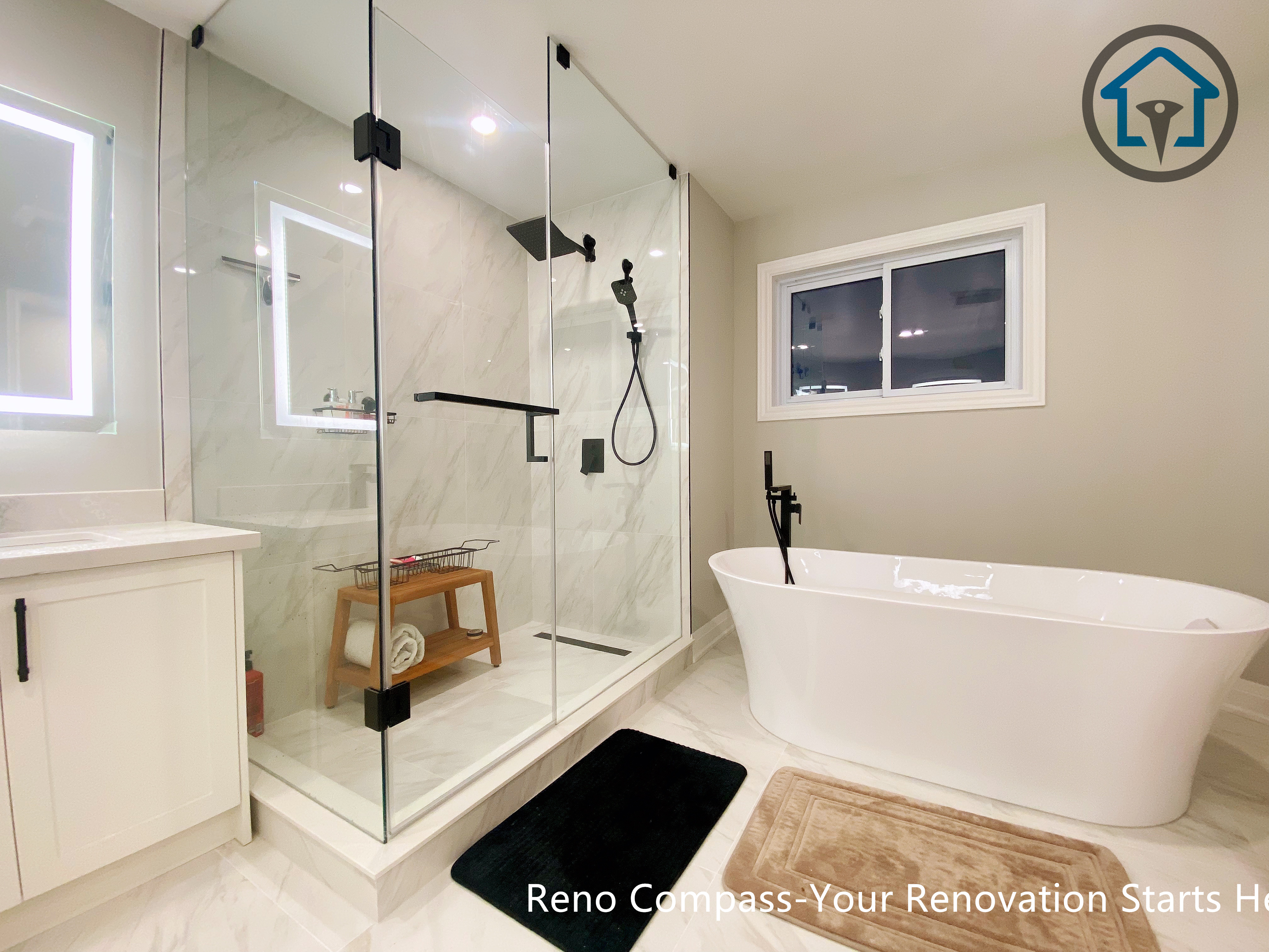 Bright and modern primary bathroom renovation in Newmarket featuring a clean layout, neutral tones, and improved accessibility designed for comfortable long-term living.