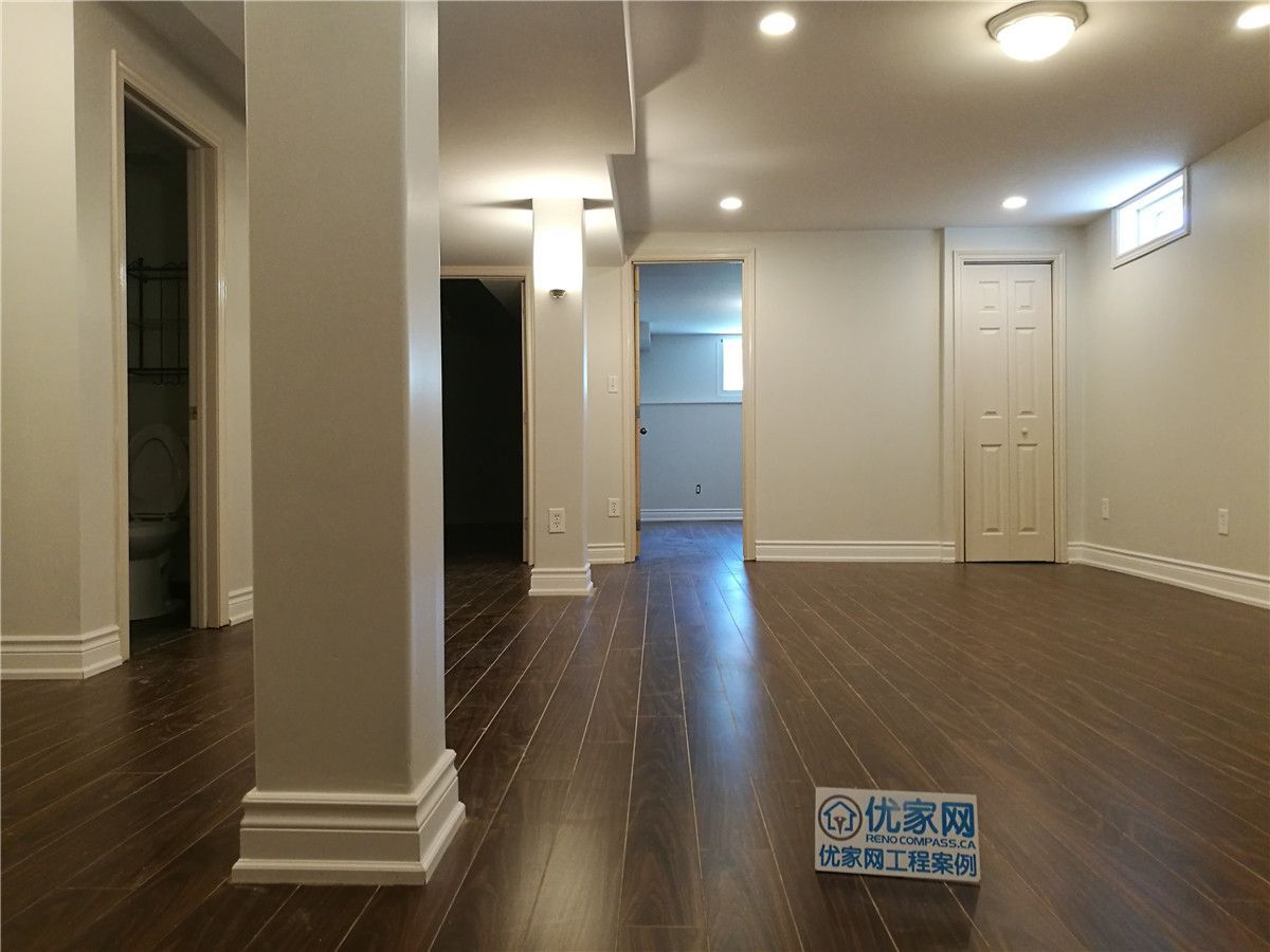 This Mississauga large-scale interior renovation includes a fully finished basement transformation designed for comfortable family living. The upgraded lower level features rich hardwood flooring, smooth wall finishes, modern recessed pot lights, and improved ceiling detailing to create a bright and welcoming space.

Strategically placed lighting enhances the open layout while maximizing ceiling height and visual clarity. As part of a comprehensive Mississauga home renovation project, this basement remodeling demonstrates professional craftsmanship, efficient space planning, and high-quality finishing suited for multi-purpose residential use across the GTA.