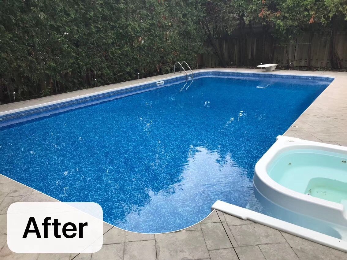 After renovation photo of a fully restored backyard swimming pool in Toronto. The new bright blue liner, clean water, and resurfaced edges highlight the professional pool transformation from old and damaged to modern and inviting. Expert pool renovation by local Toronto specialists.