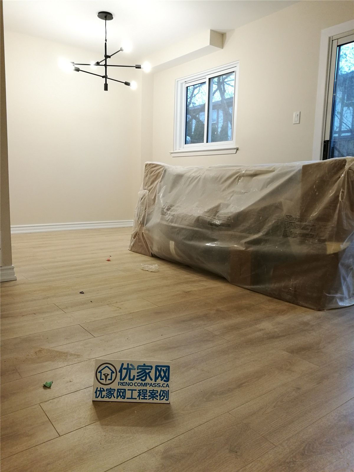 This Markham basement renovation project features newly installed wide-plank flooring, modern ceiling light fixture, and freshly painted walls to create a clean, bright, and functional living space. Completed by a professional Toronto renovation team, the upgrade improves comfort, lighting, and overall property value for homeowners in the GTA.