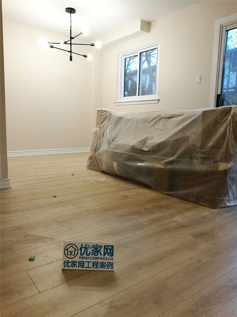 This Markham basement renovation project features newly installed wide-plank flooring, modern ceiling light fixture, and freshly painted walls to create a clean, bright, and functional living space. Completed by a professional Toronto renovation team, the upgrade improves comfort, lighting, and overall property value for homeowners in the GTA.