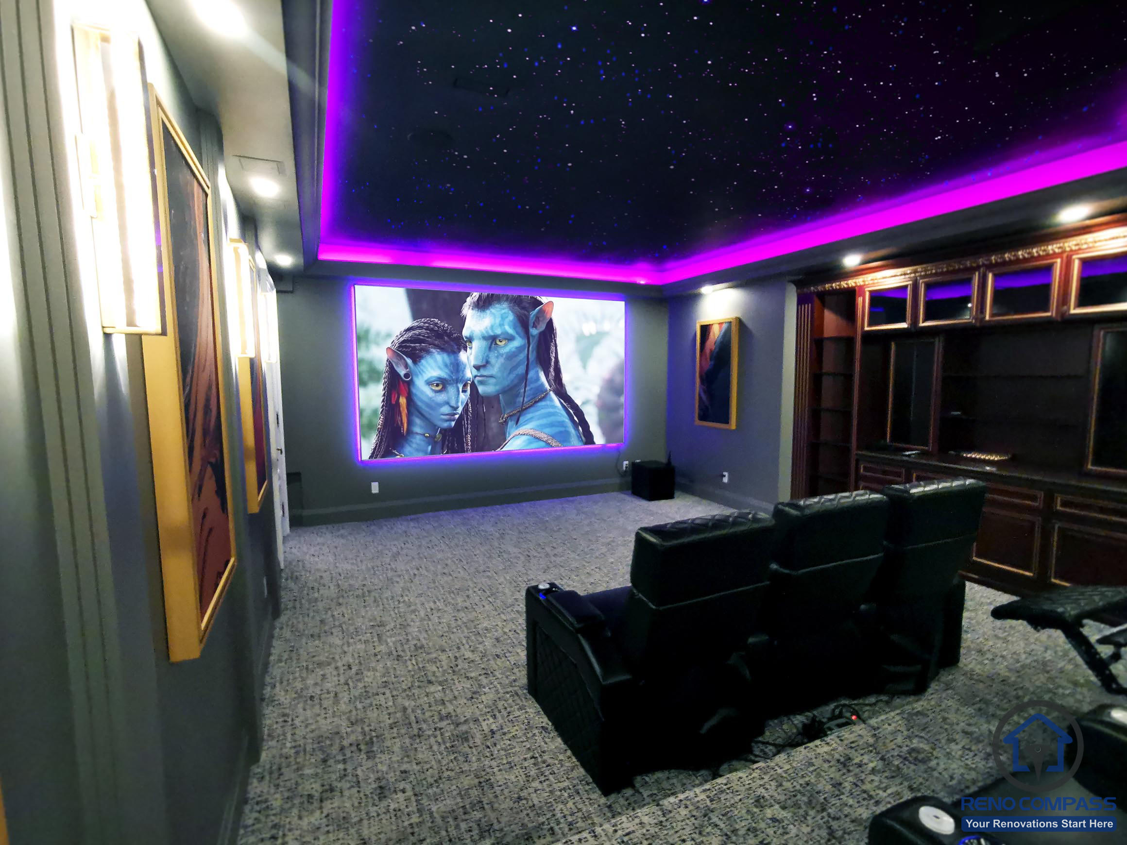 Full view of a custom home theatre renovation in Aurora featuring tiered seating, star ceiling, ambient LED lighting, and a large projection screen for immersive entertainment.