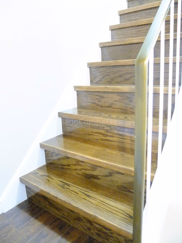 This North York interior renovation highlights newly installed hardwood flooring and refined hallway finishing details. Completed by a professional Toronto renovation company, the project enhances overall home flow, durability, and visual continuity with precise installation and modern interior upgrades.