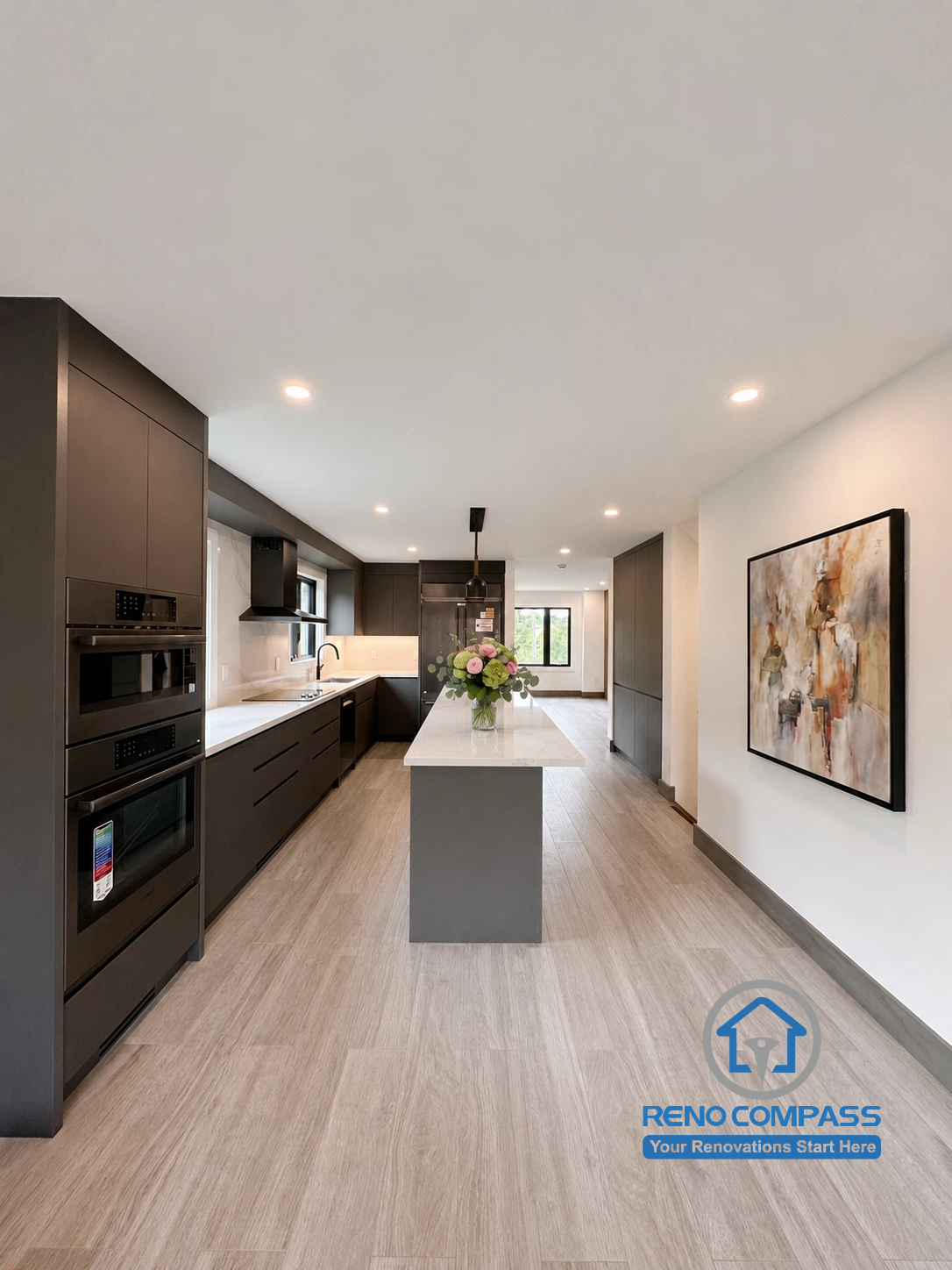 Renovation in Markham
A spacious open-concept kitchen featuring a large island, quartz countertops, and custom cabinetry designed for modern family living.