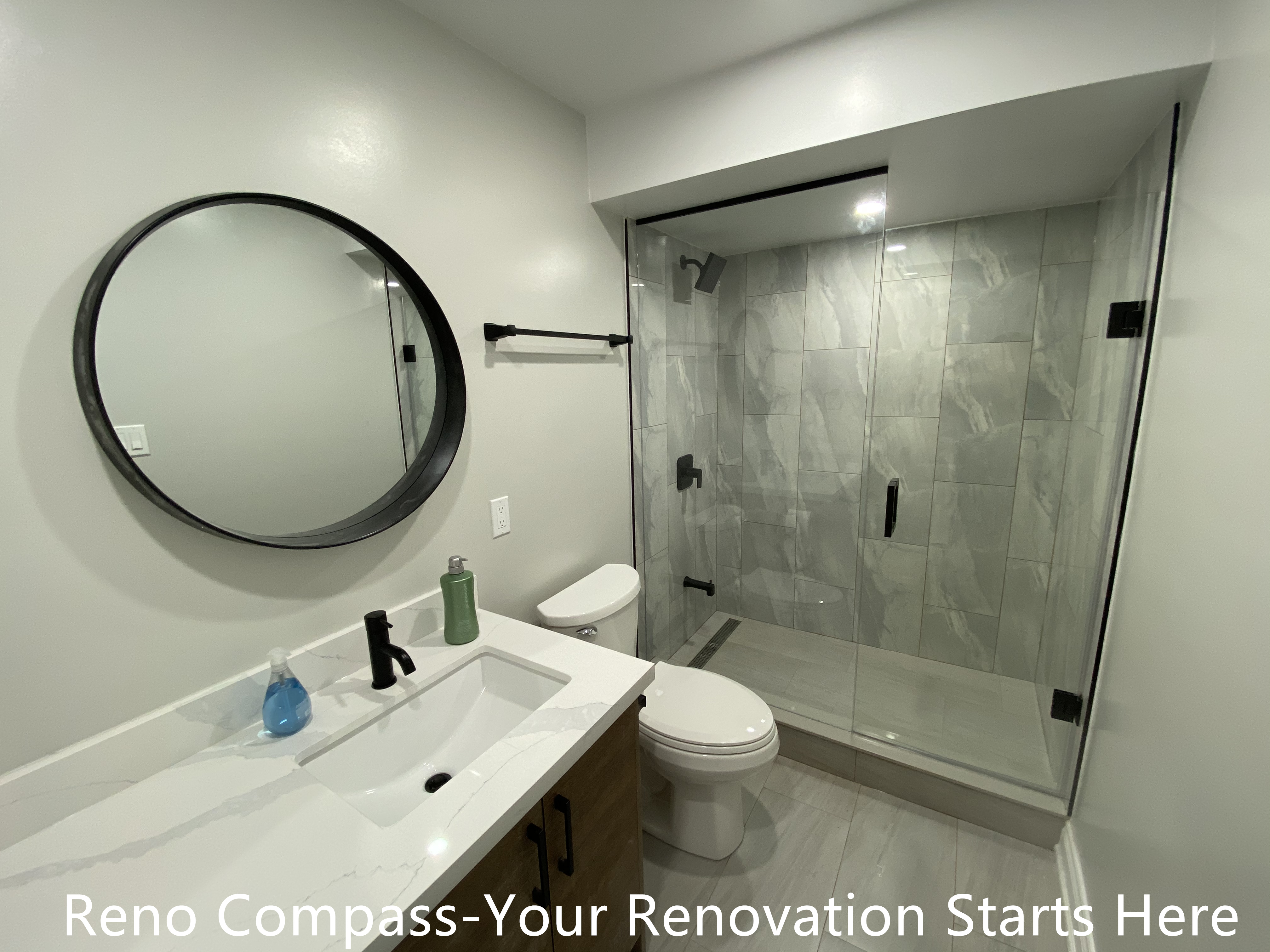 This Aurora basement renovation features a clean, open-concept layout designed to maximize usable space and ceiling height. Neutral wall tones, durable wood-look flooring, and recessed lighting create a bright and inviting environment suitable for a family room, home office, or multi-purpose living area. The design prioritizes clear circulation, concealed structural elements, and a modern, low-maintenance finish, transforming the basement into a comfortable extension of the main living space. Completed by Reno Compass, Toronto renovation contractor.