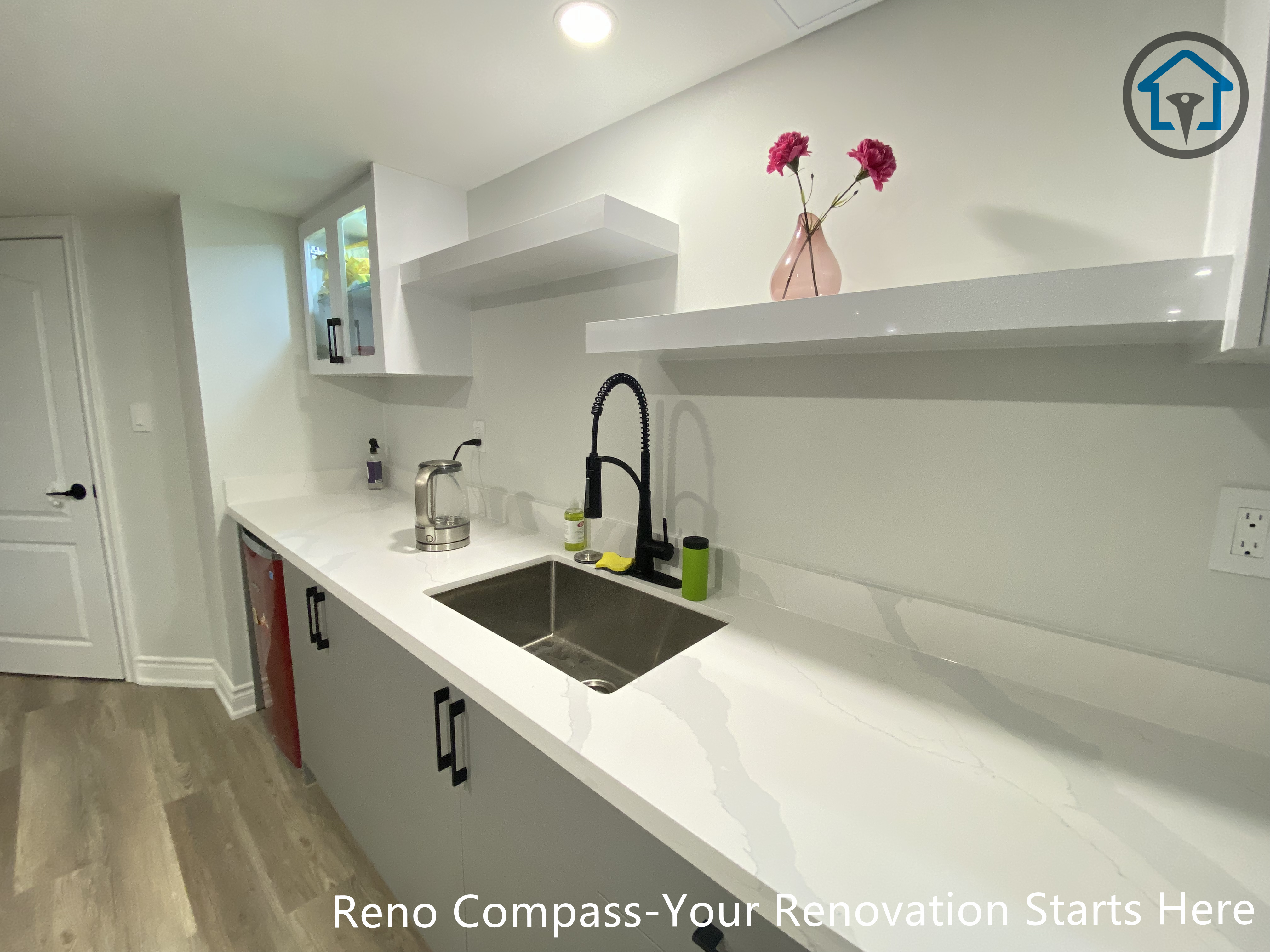 Basement hallway renovation in Vaughan improving circulation, wall finishing, and lighting for a clean and connected interior layout.