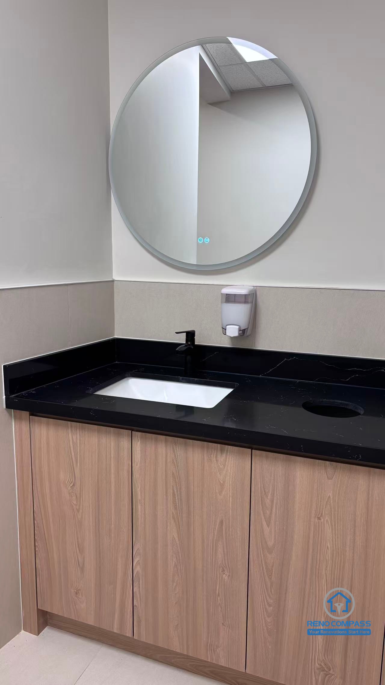 This North York commercial renovation includes a modern washroom vanity installation with custom cabinetry, black countertop, and upgraded sink fixtures. Completed by a professional Toronto renovation company, the project focuses on clean design, durability, and functionality to support daily operations in a busy bubble tea shop environment.