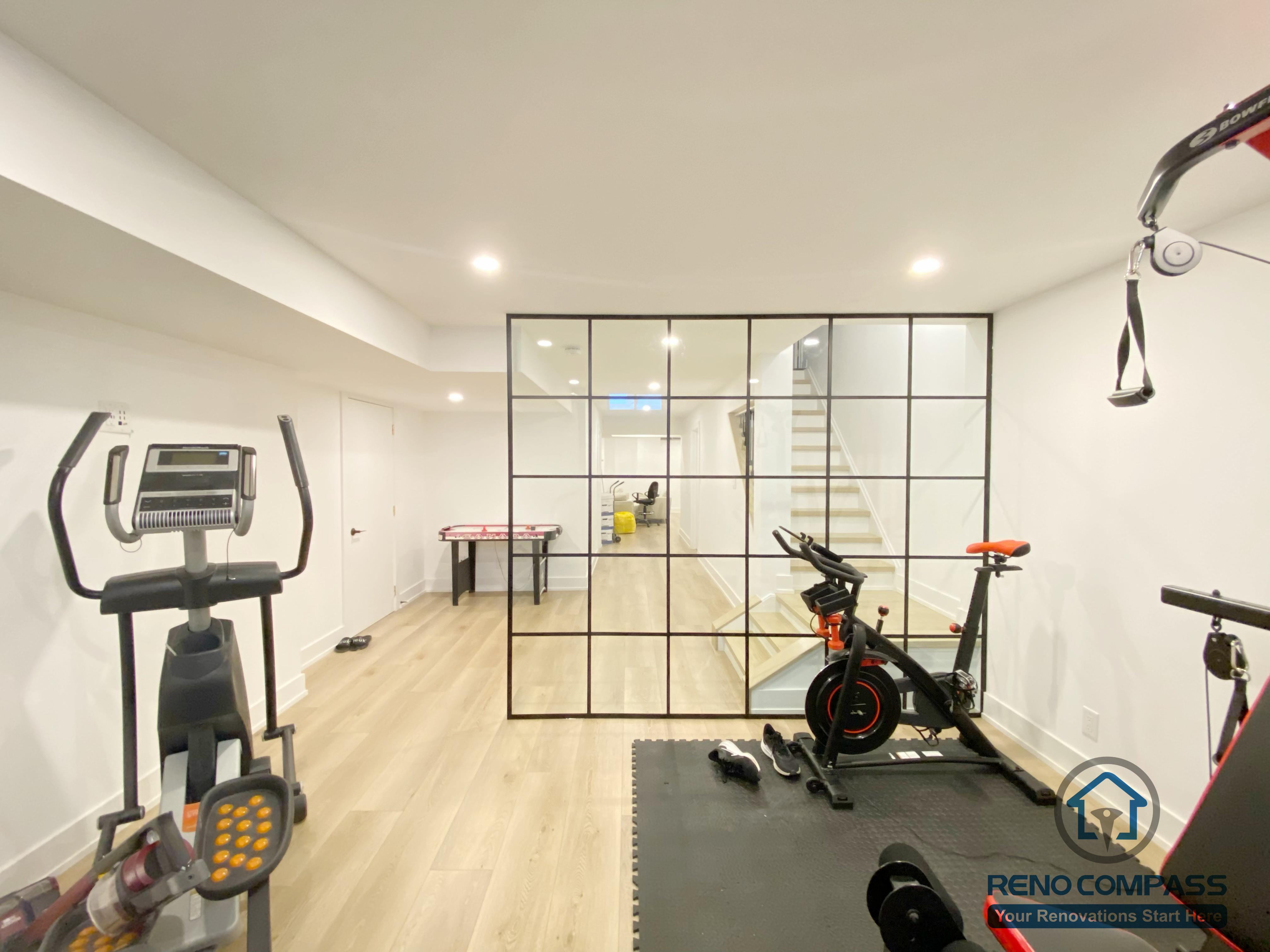 This basement gym room provides a dedicated home fitness space with a clean, modern design. Durable finishes and efficient lighting make it ideal for daily workouts as part of this Markham basement renovation.