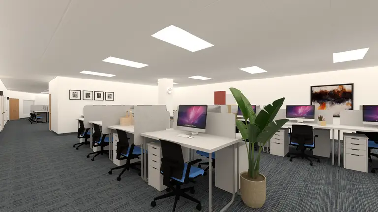 This image presents the renovated open office area of an ICBC Toronto branch, designed to support efficient daily operations and a structured working environment. The layout features modular workstations, clean-lined office desks, neutral-toned finishes, and integrated overhead lighting to ensure visual comfort and functionality. Wood doors, glass panels, and soft carpet flooring enhance acoustic control and spatial order, reflecting contemporary commercial office renovation standards for financial institutions in Toronto.