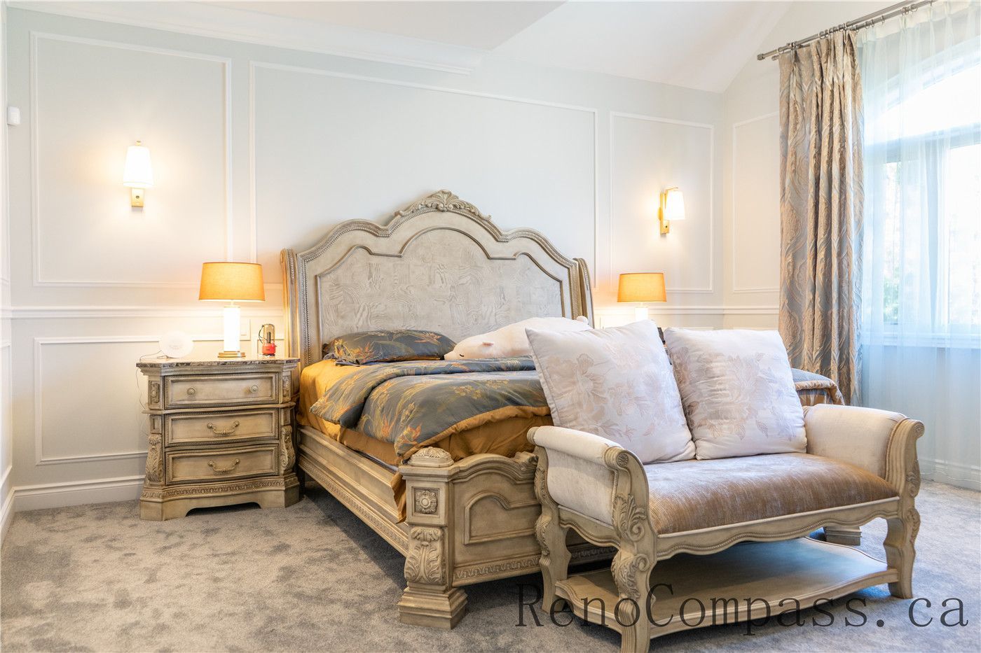 This Richmond Hill bedroom renovation features classic wall panel detailing, upgraded lighting, soft carpeting, and a refined layout that enhances comfort and elegance. The cohesive design and quality finishes create a warm, luxurious atmosphere, showcasing the craftsmanship of a trusted Toronto renovation company specializing in full house interior renovations.