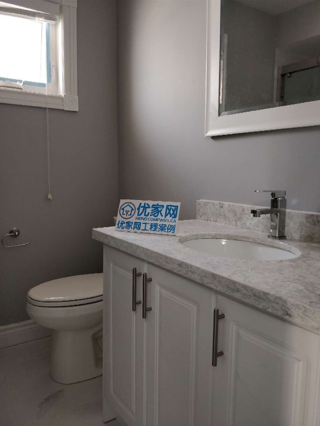 This bathroom renovation in Ajax features a modern vanity with a quartz countertop, integrated sink, and updated fixtures. The clean design, neutral tones, and improved layout create a functional and stylish space for everyday use. As part of a full home renovation, this bathroom upgrade enhances both comfort and property value with durable and easy-to-maintain materials.
