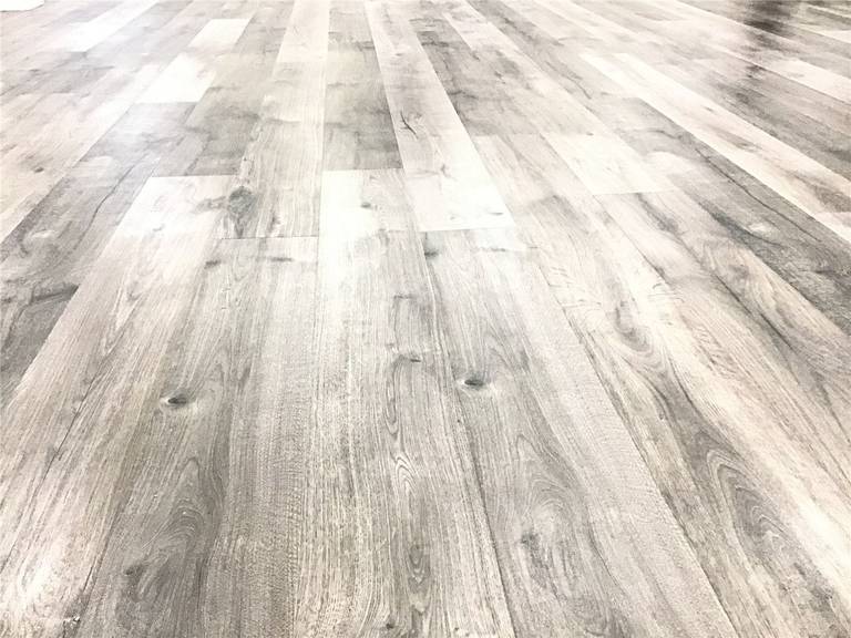 High-quality grey-toned vinyl plank flooring installed in this Newmarket basement renovation. The modern wood-look finish adds warmth, durability, and a clean contemporary feel, making the space both stylish and functional for everyday living.