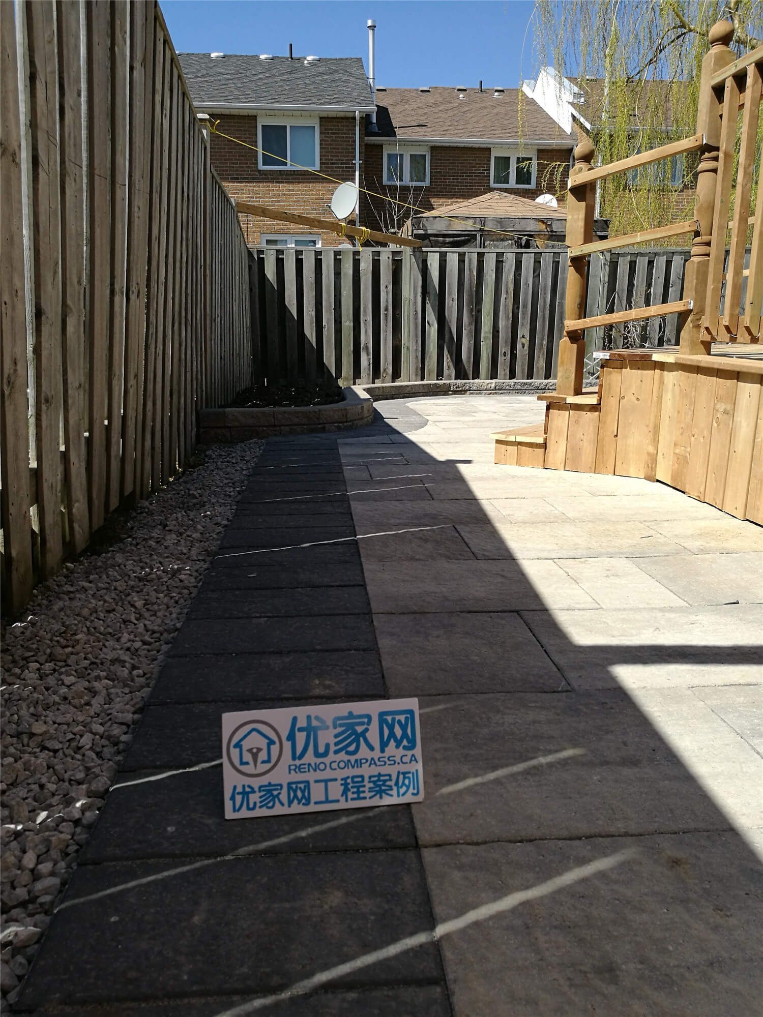 This Richmond Hill landscaping renovation features a newly installed stone walkway designed to improve accessibility and enhance the side yard’s overall appearance. Large-format interlocking pavers create a clean, modern pathway between the fence and exterior wall, while proper grading and gravel drainage ensure durability and low maintenance. The project focuses on functionality, safe drainage, and a polished outdoor finish, transforming a narrow side yard into a practical and visually appealing landscape feature for everyday use.