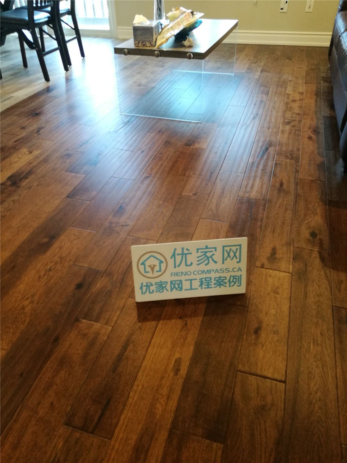 Completed hardwood flooring installation in Richmond Hill and Markham interior renovation project, featuring high-quality wood finish and precision craftsmanship by Toronto renovation company Reno Compass Inc.