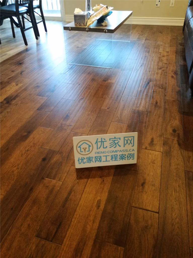 Completed hardwood flooring installation in Richmond Hill and Markham interior renovation project, featuring high-quality wood finish and precision craftsmanship by Toronto renovation company Reno Compass Inc.