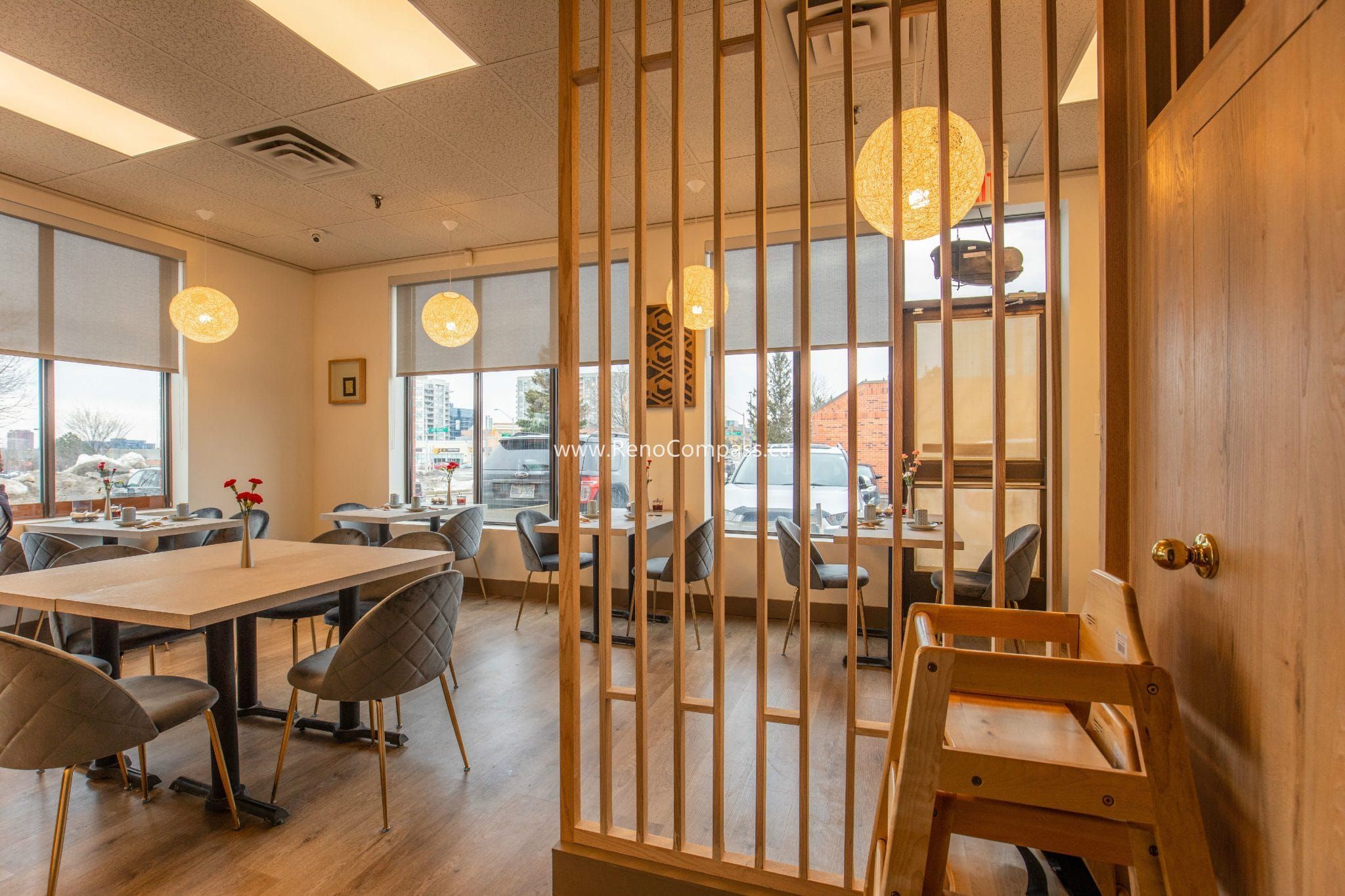 This Richmond Hill Chinese restaurant renovation by Toronto renovation company Reno Compass Inc. includes a modern commercial washroom designed for both functionality and aesthetic appeal. The upgraded space features wood-texture wall finishes, custom vanity cabinetry, a stone countertop, contemporary vessel sink, and warm ambient lighting. Thoughtful material selection and clean design details create a comfortable and hygienic restroom environment, enhancing the overall customer experience and supporting daily restaurant operations with durable, easy-to-maintain finishes.