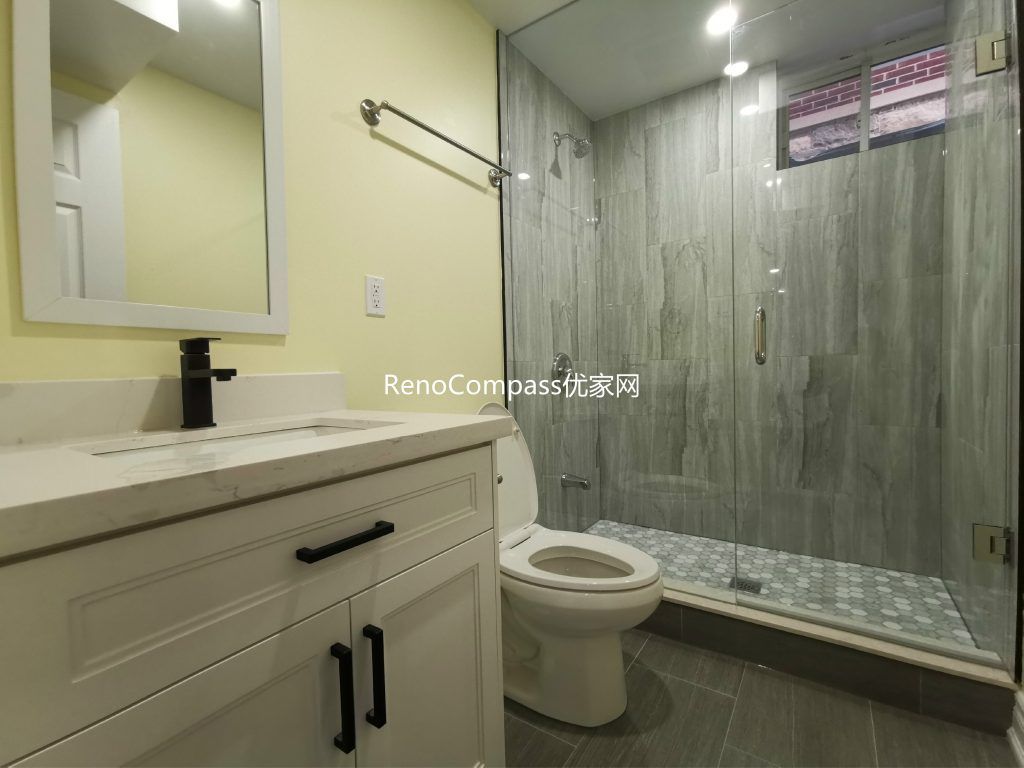 This newly renovated basement bathroom in Richmond Hill features a modern glass-enclosed shower, custom vanity, and durable tile finishes designed for both style and practicality. Completed by a professional Toronto renovation company, the bathroom upgrade enhances everyday comfort and adds strong rental or in-law suite potential. Clean design lines, quality fixtures, and efficient space planning create a bright and functional bathroom suited for modern basement living.