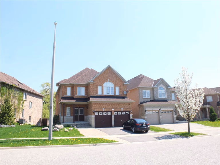 This image showcases a completed roofing renovation project in Richmond Hill, featuring a well-maintained residential home with an upgraded roof system. The project focuses on improving roof durability, weather resistance, and overall curb appeal. As a professional Toronto renovation company, Reno Compass Inc. provides high-quality roofing renovation services for homeowners across Richmond Hill and the Greater Toronto Area, ensuring long-term protection and enhanced property value.