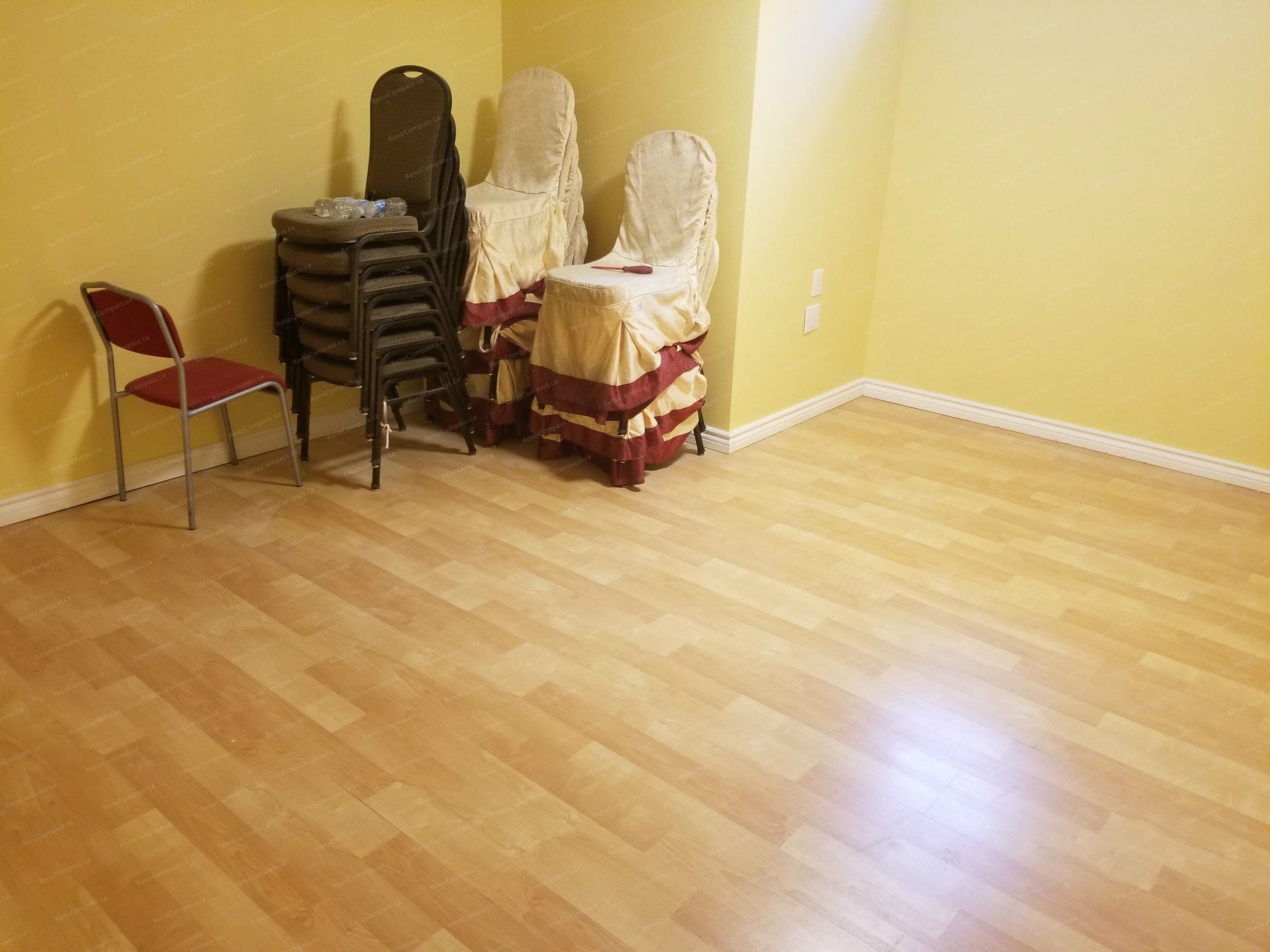 A completed basement room in this Vaughan basement renovation project, featuring fresh wall finishes, durable laminate flooring, and a bright, functional layout. The clean and flexible space is ideal for use as a guest room, home office, or recreation area. Renovation completed by a professional Toronto renovation company with attention to comfort and practicality.