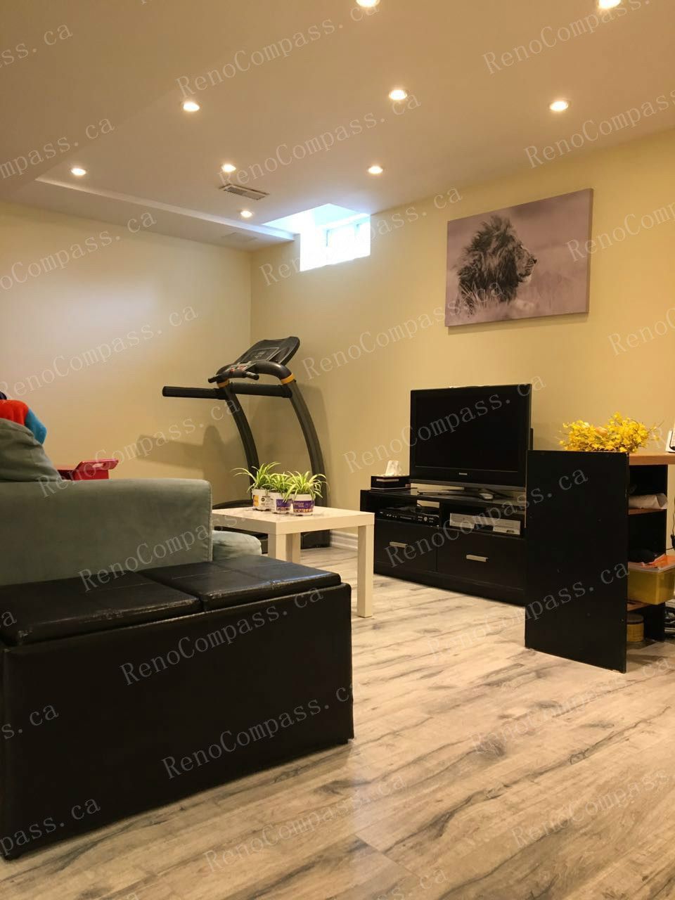 This Mississauga basement renovation showcases a bright and functional living area within a one-bedroom, one-bathroom basement layout. Featuring modern flooring, recessed lighting, and a comfortable entertainment space, the finished basement was completed by a professional Toronto renovation company to create a welcoming environment ideal for family use or rental living.